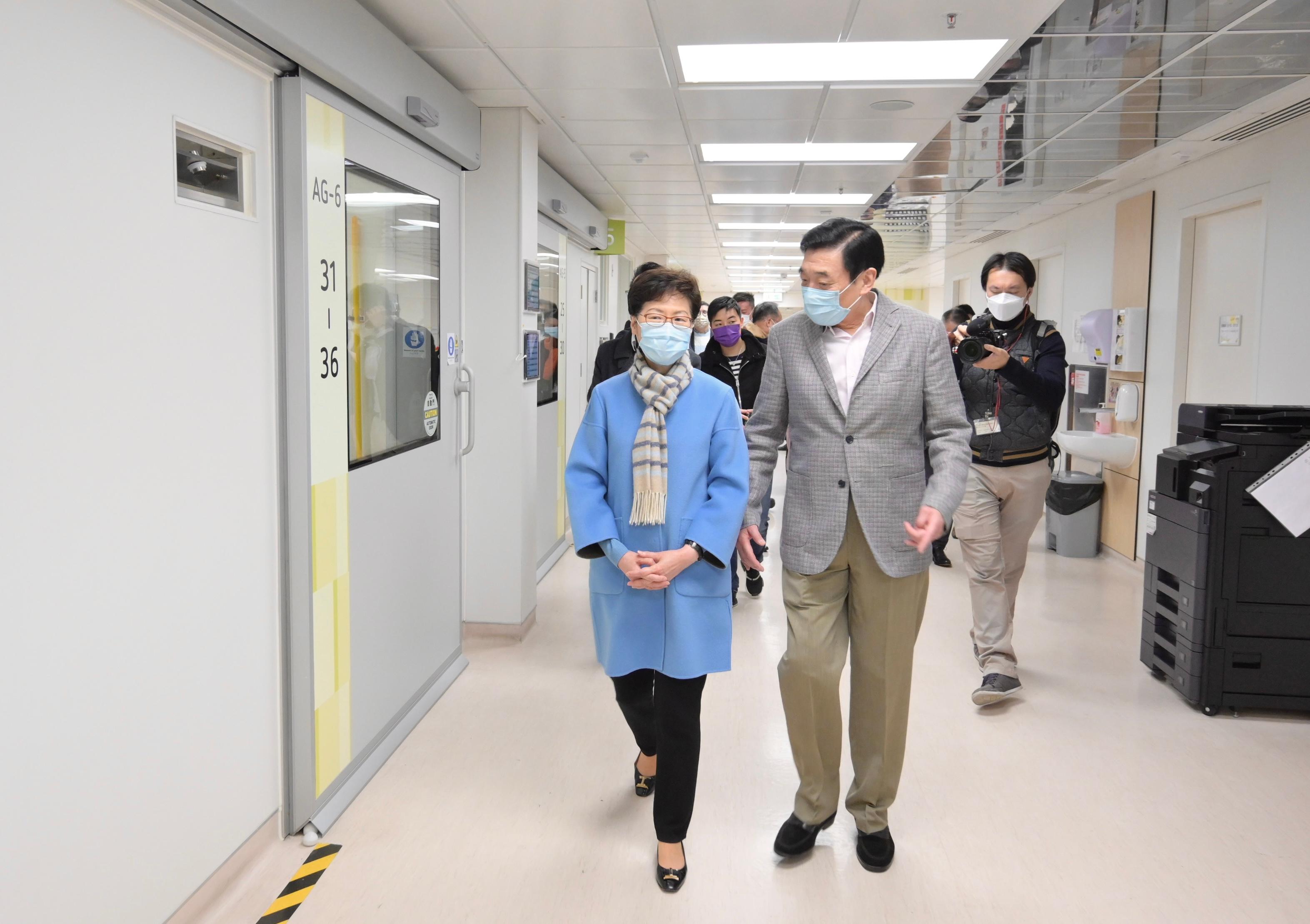 The Chief Executive, Mrs Carrie Lam, visited the North Lantau Hospital Hong Kong Infection Control Centre today (February 3). Photo shows Mrs Lam (left) receiving a briefing from the Chairman of the Hospital Authority, Mr Henry Fan (right), on the operation of the Centre. 
