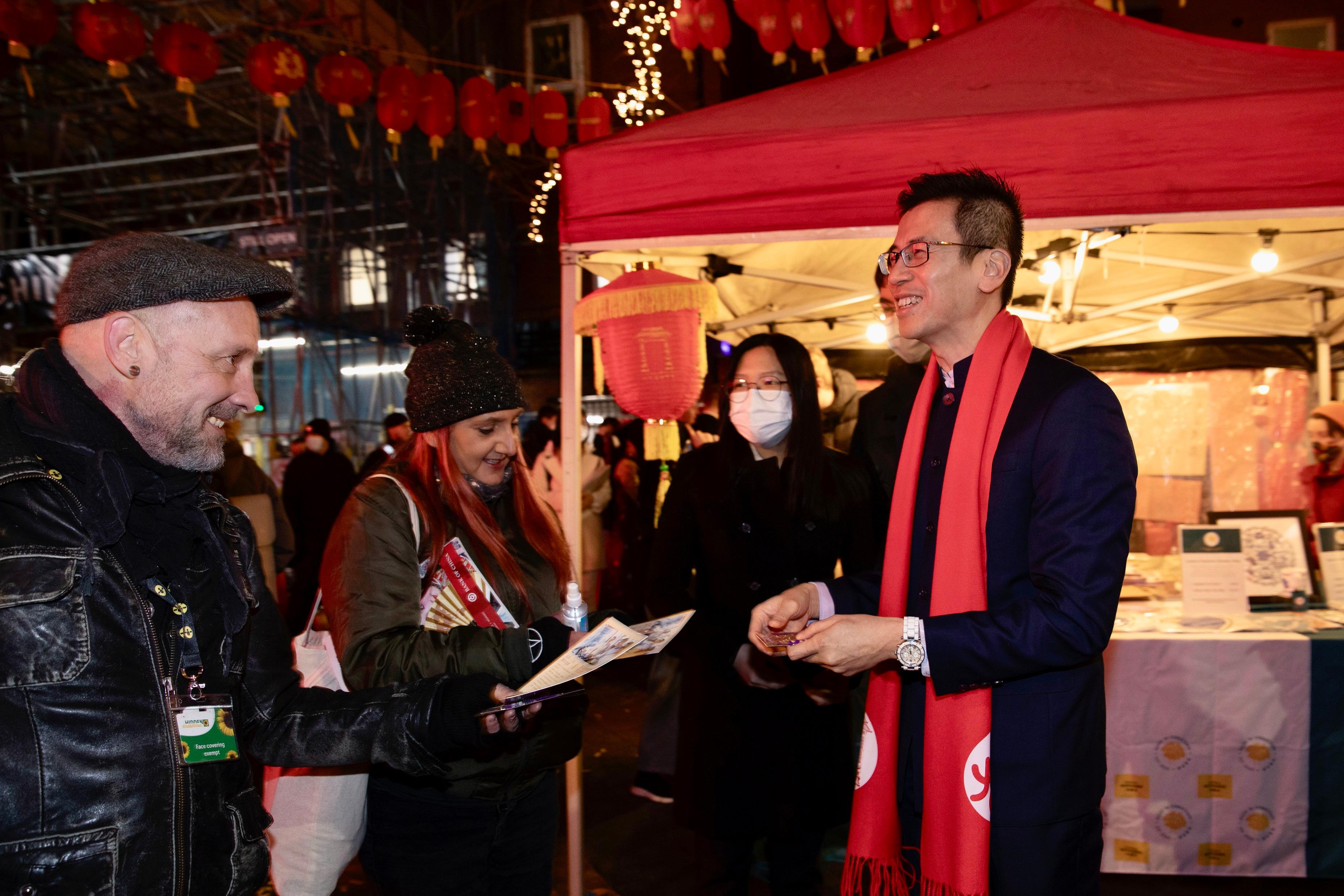 London ETO celebrates Chinese New Year amid pandemic. In end-January, the Director-General of London ETO Mr Gilford Law (first right) attended a Chinese New Year celebration event  organised by the London Chinatown Chinese Association in Chinatown greeting the United Kingdom community with souvenirs featuring the theme of the Year of the Tiger.