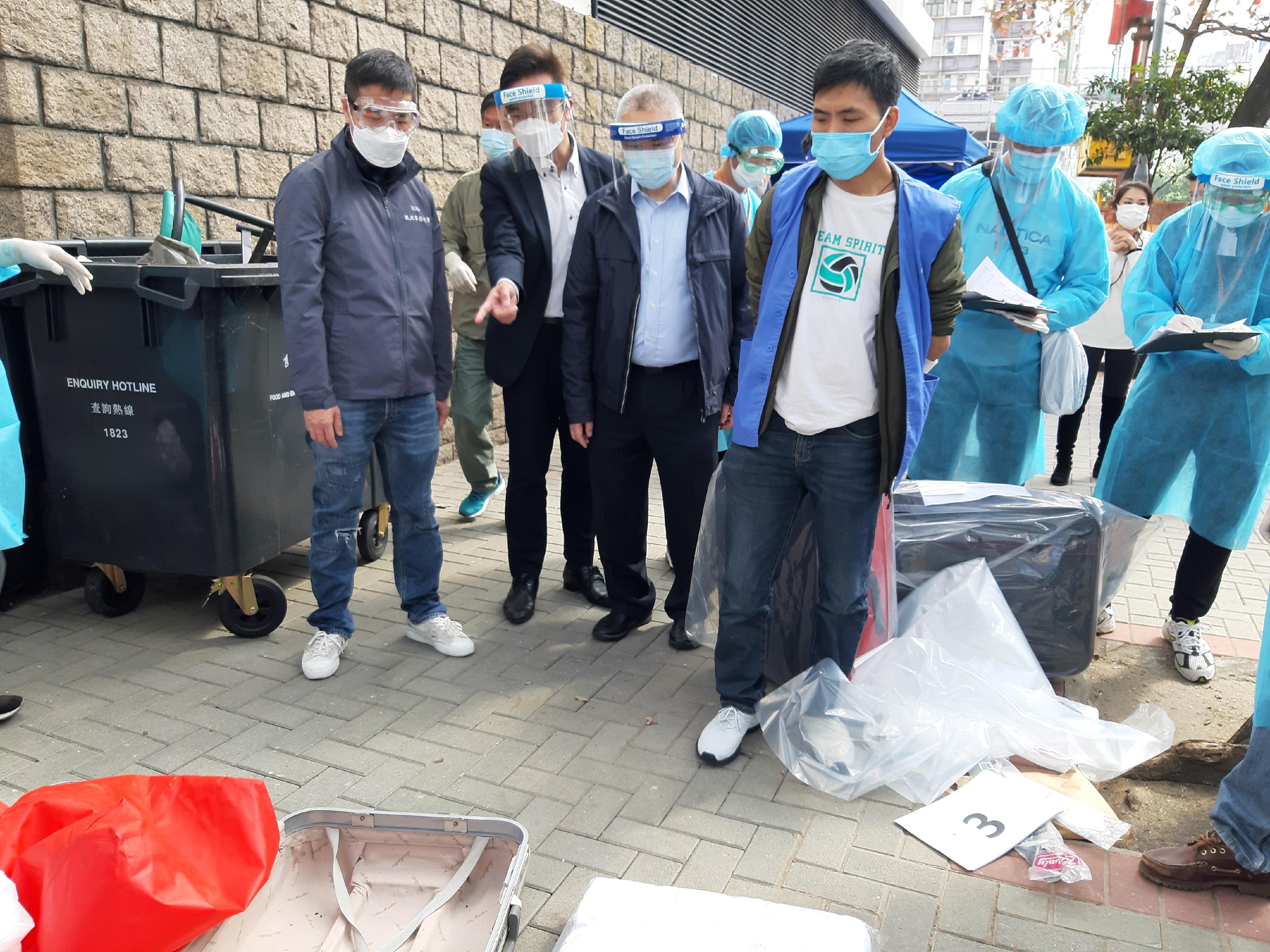 The Yau Tsim Mong District Office, together with relevant Government departments, today (February 28) conducted a joint operation to clear miscellaneous articles outside the Yau Ma Tei Jockey Club General Out-patient Clinic.  Photo shows the District Officer (Yau Tsim Mong), Mr Edward Yu (first left), the Chairman of the Yau Tsim Mong East Area Committee, Mr Daniel Au Tin-che, (second left), and Mr Leung Wah-sing, JP (second right) inspecting the operation outside the Clinic and witnessing the handling of the articles at the site.
