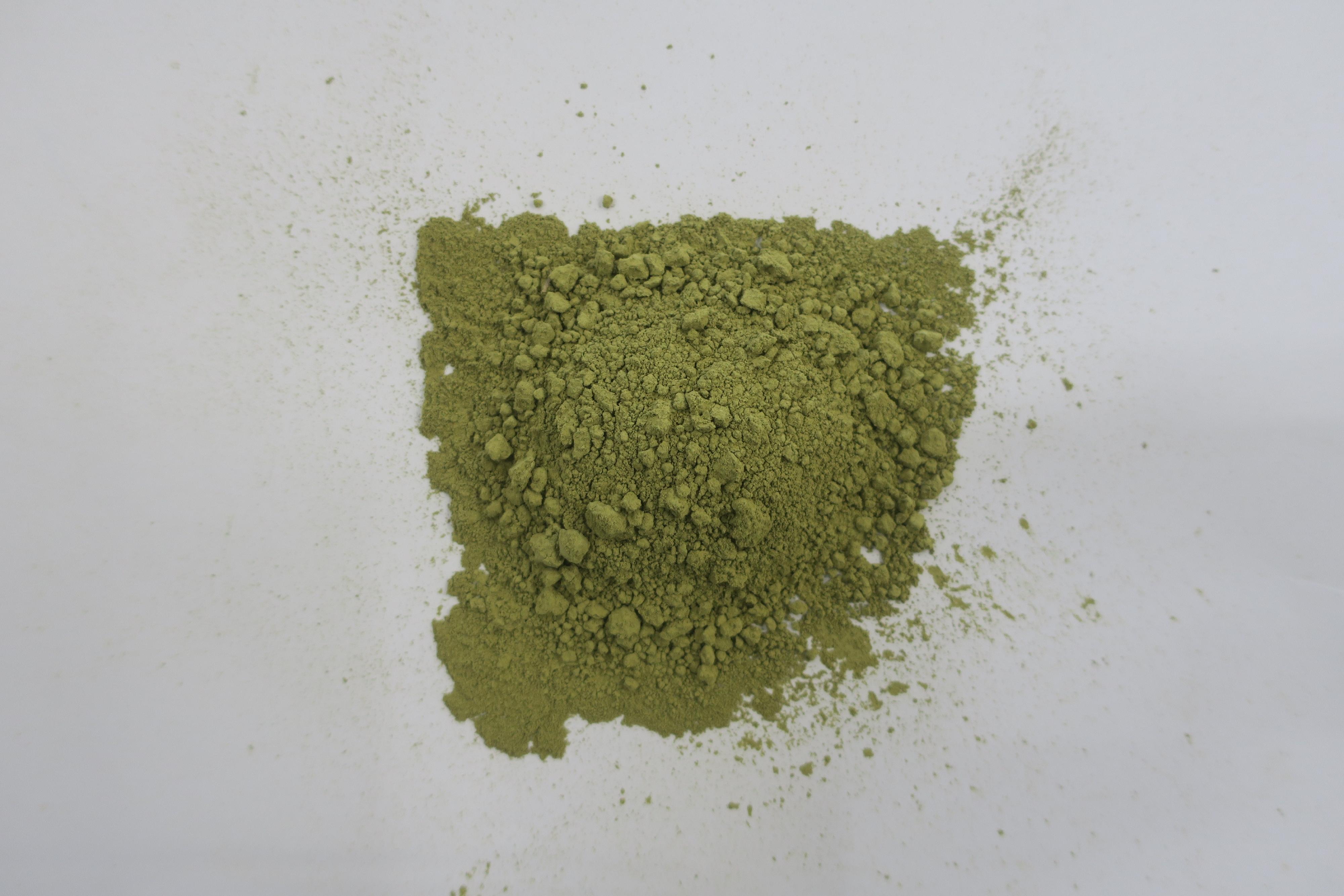 Hong Kong Customs on March 8 and yesterday (March 14) seized a total of about 52 tonnes of suspected mitragynine with an estimated market value of about $138 million at the Kwai Chung Customhouse Cargo Examination Compound. Photo shows the green powder suspected to be mitragynine.