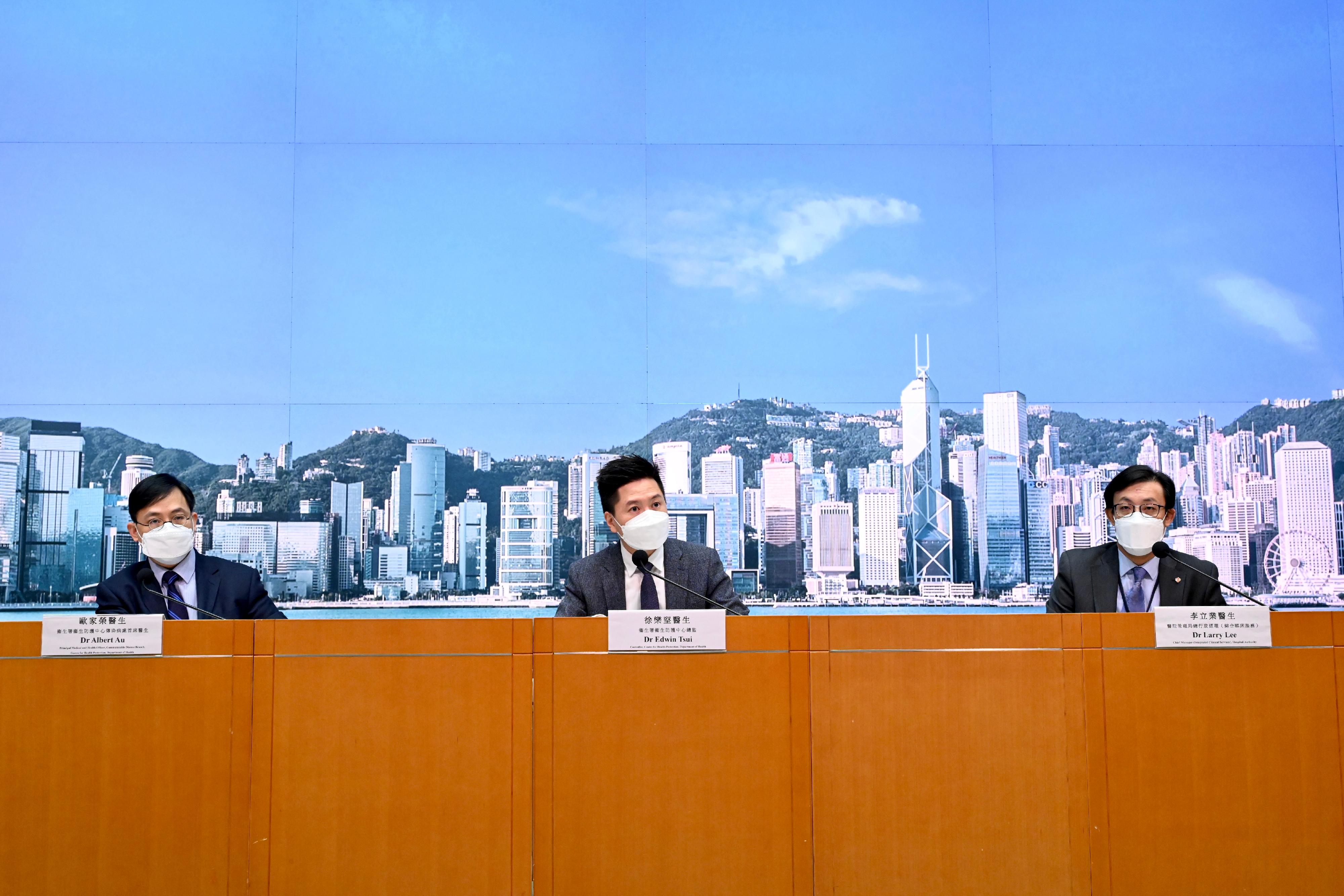 The Controller of the Centre for Health Protection (CHP) of the Department of Health (DH), Dr Edwin Tsui (centre); the Principal Medical and Health Officer of the Communicable Disease Branch of the CHP of the DH, Dr Albert Au (left); and the Chief Manager (Integrated Clinical Services) of the Hospital Authority, Dr Larry Lee (right), hold a press briefing on the latest situation of COVID-19 today (March 23).