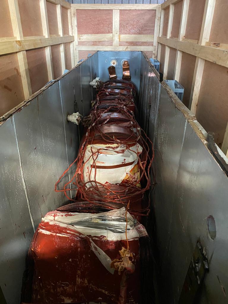 Hong Kong Customs detected a suspected drug trafficking case using large-scale electric transformer last month and seized about 120 kilograms of suspected cocaine with an estimated market value of about $110 million. Photo shows the large-scale electric transformer used to conceal the drugs. Customs officers found ten metal boxes wrapped with multiple layers of metal plate inside after the flammable liquid was pumped out.