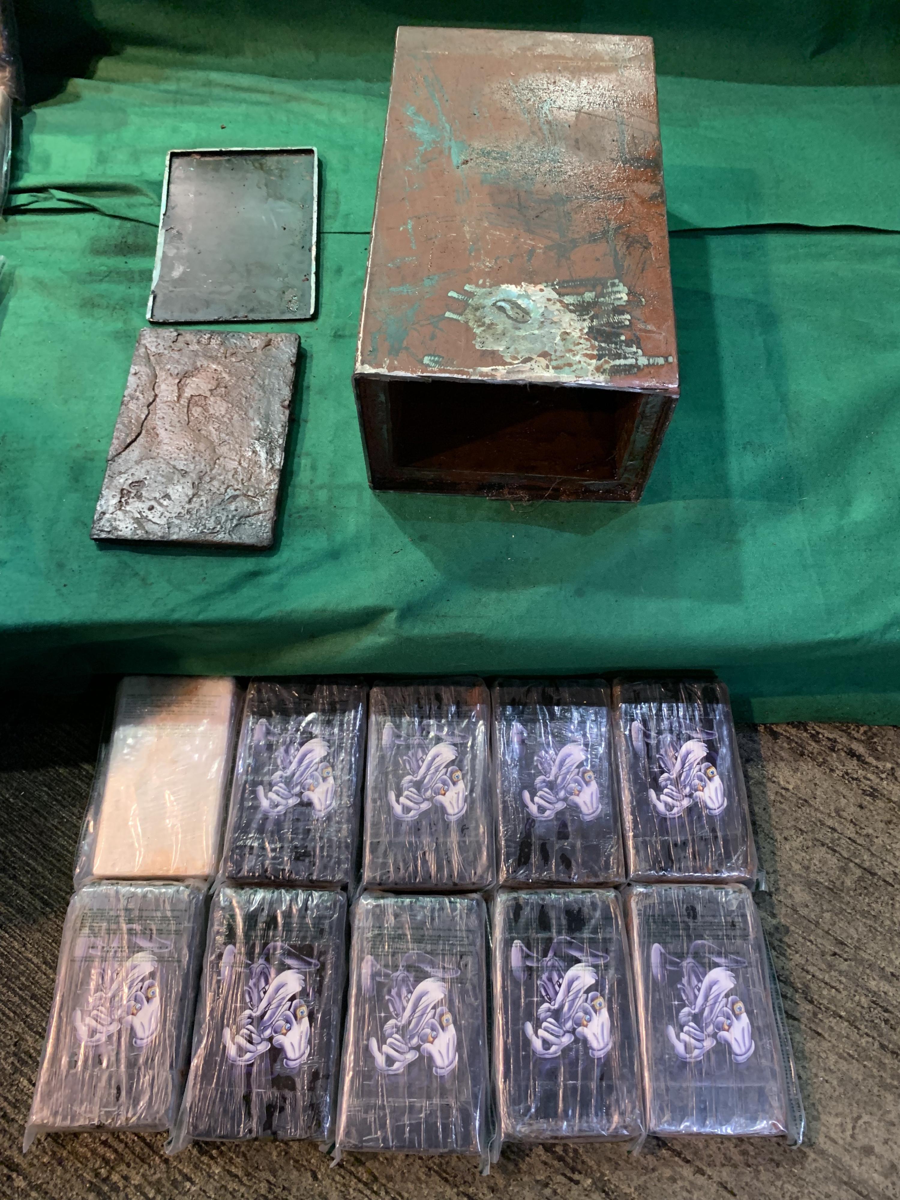 Hong Kong Customs detected a suspected drug trafficking case using large-scale electric transformer last month and seized about 120 kilograms of suspected cocaine with an estimated market value of about $110 million. Photo shows some of the suspected cocaine seized and the metal box used to conceal the drugs.