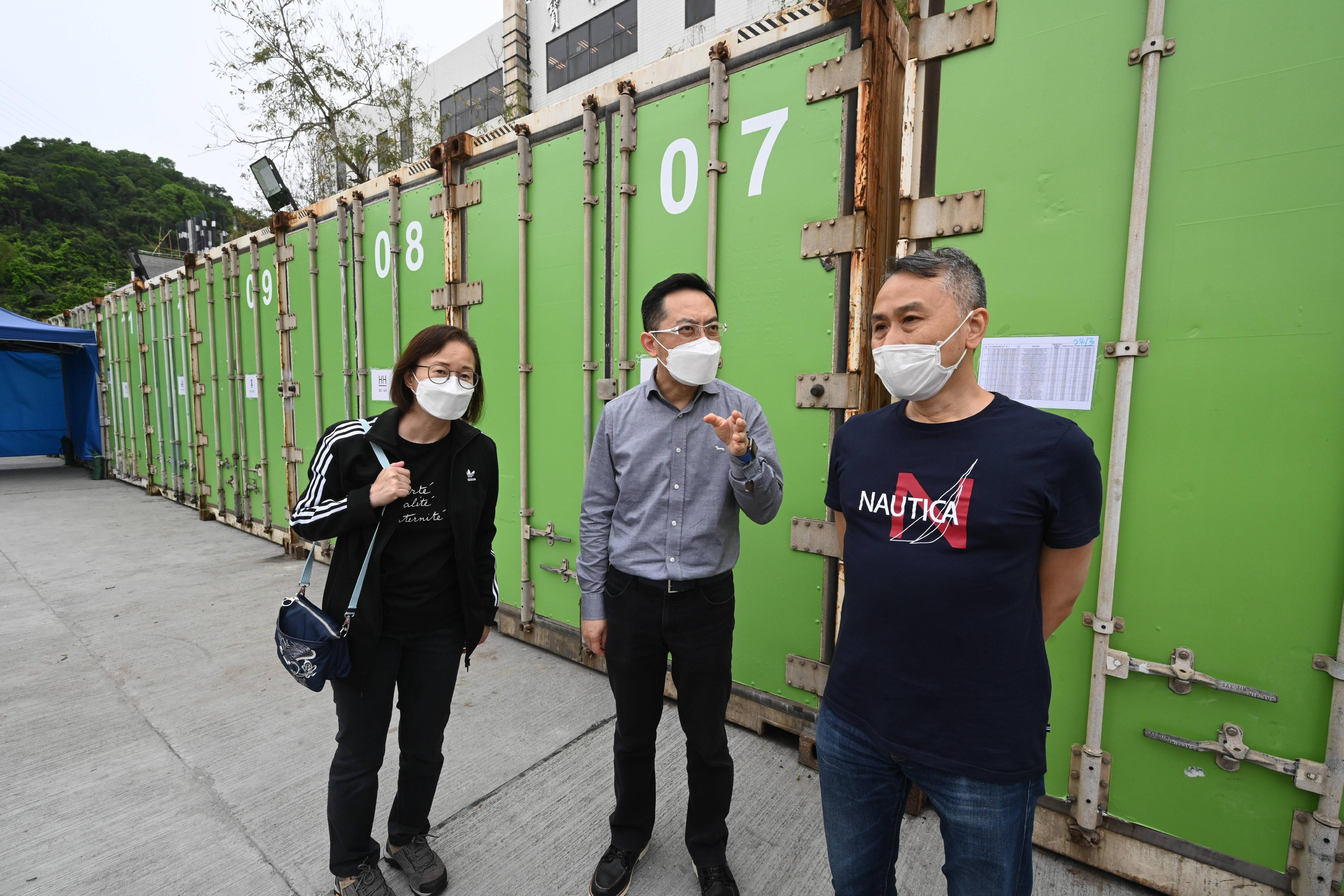 The Government has earlier installed new storage facility at government sites near the Fu Shan Public Mortuary in Sha Tin to expand storage capacity. Photo shows the Director of Health, Dr Ronald Lam (centre), accompanied by the Controller of Regulatory Affairs of the Department of Health (DH), Dr Amy Chiu (left), and the Consultant Forensic Pathologist-in-charge of the DH, Dr Poon Wai-ming (right), today (March 27) inspecting the new storage facility.