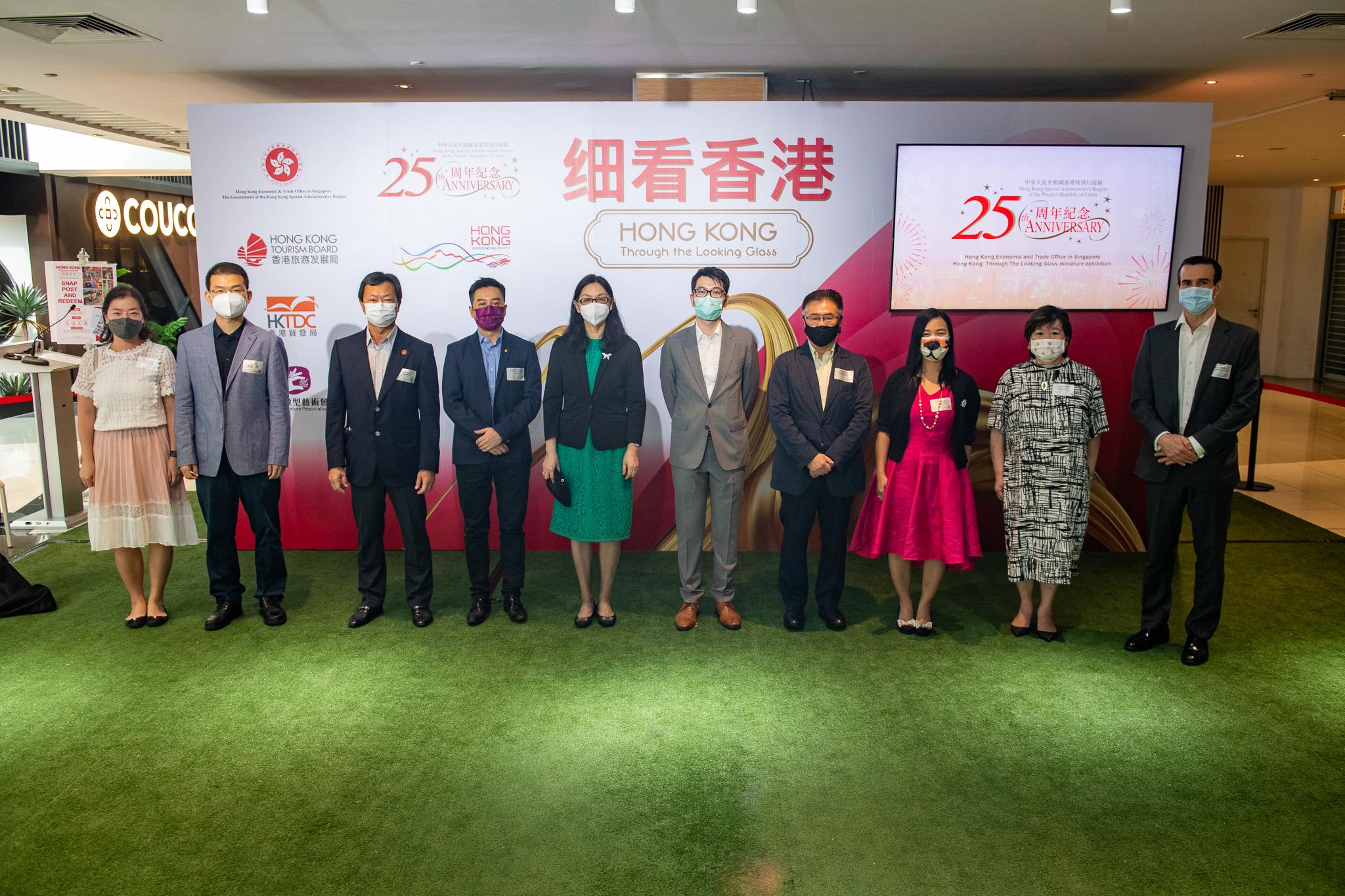 The "Hong Kong: Through the Looking Glass" miniature exhibition organised by the Hong Kong Economic and Trade Office in Singapore opened in Singapore today (April 4). Photo shows the Director of the Hong Kong Economic and Trade Office in Singapore, Mr Wong Chun To (fifth right), picturing with Counsellor of Economic and Commercial Office, Ms Zhong Manying (fifth left). 

