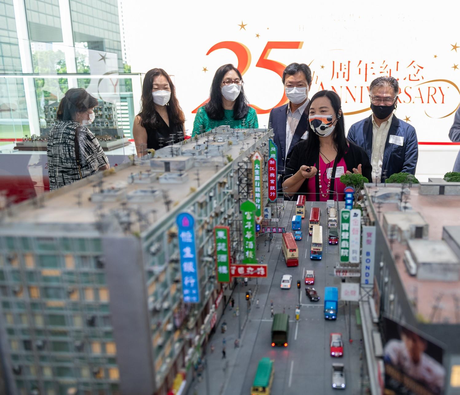 The "Hong Kong: Through the Looking Glass" miniature exhibition organised by the Hong Kong Economic and Trade Office in Singapore opened in Singapore today (April 4). Photo shows guests viewing the exhibits during a guided tour after the opening ceremony of the miniature exhibition.

