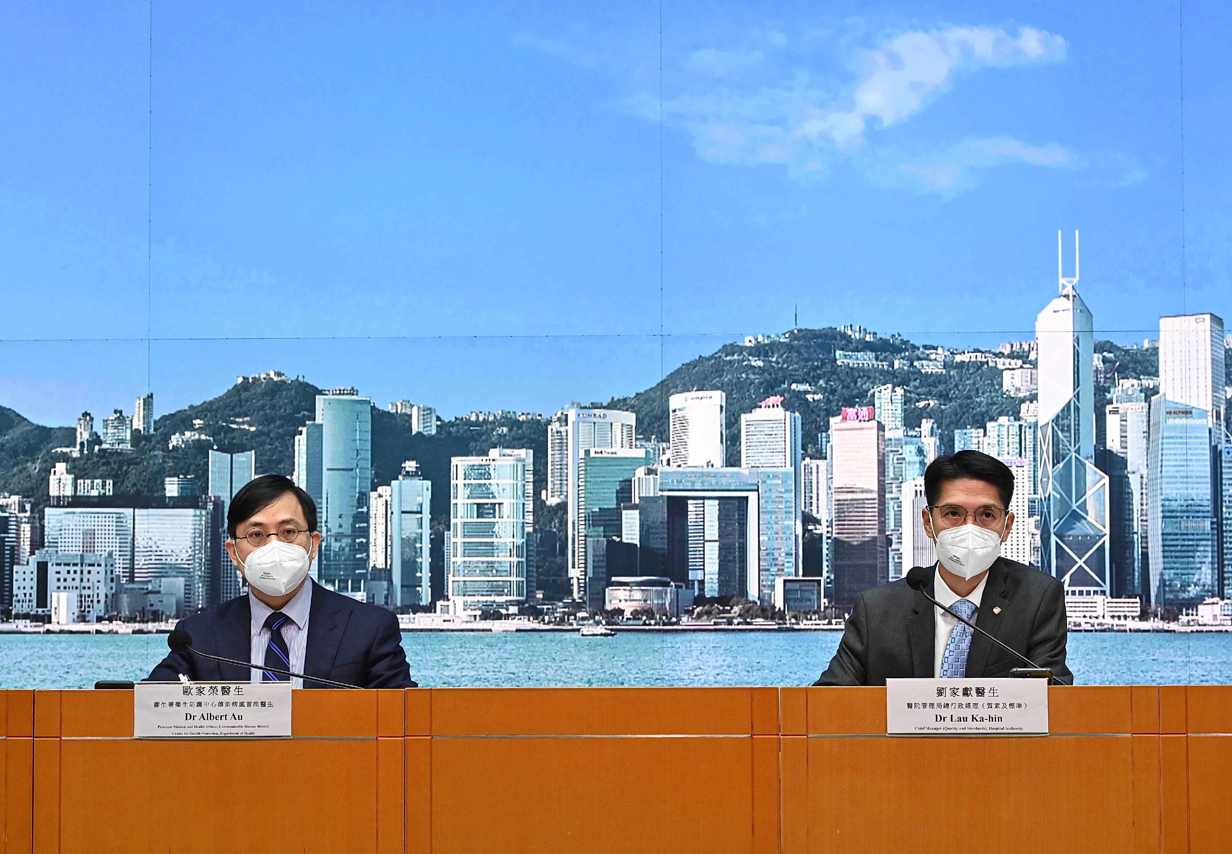 The Principal Medical and Health Officer of the Communicable Disease Branch of the Centre for Health Protection of the Department of Health, Dr Albert Au (left), and the Chief Manager (Quality and Standards) of the Hospital Authority, Dr Lau Ka-hin, hold a press briefing on the latest situation of COVID-19 today (April 8).
