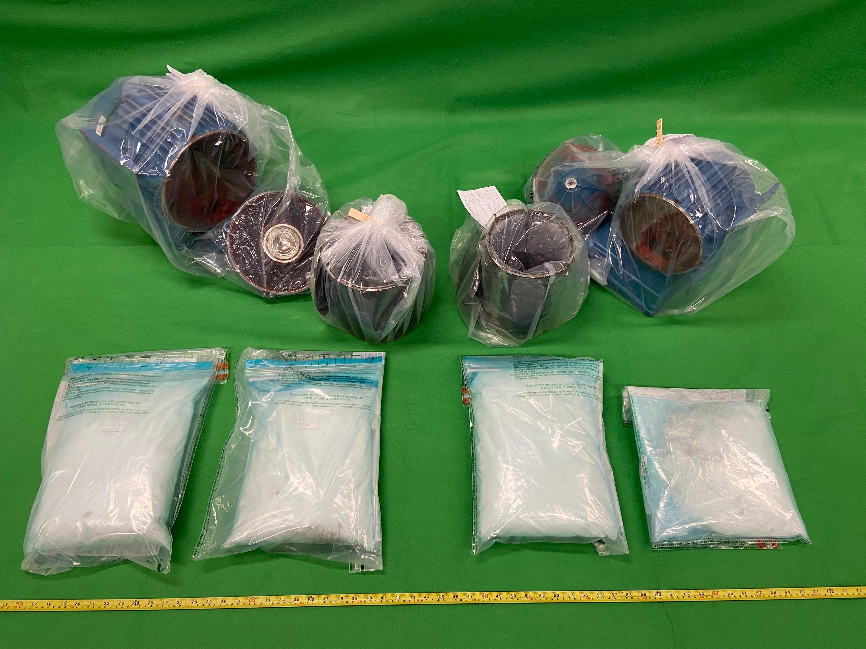 Hong Kong Customs seized about 11 kilograms of suspected cocaine with an estimated market value of about $9.6 million at Hong Kong International Airport on April 9. Photo shows the suspected cocaine seized and the electronic engines used to conceal the drugs.