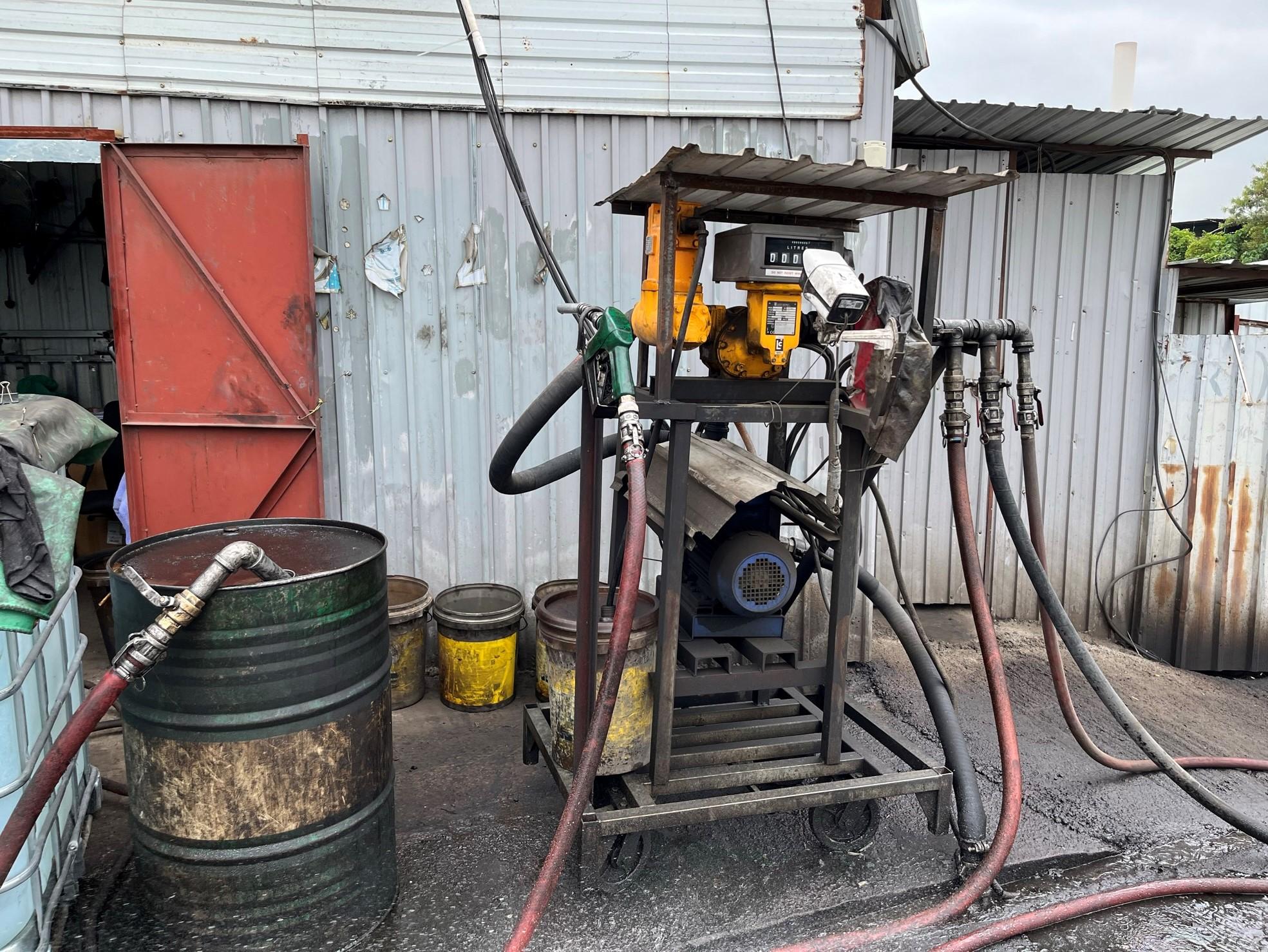 The Fire Services Department (FSD), the Hong Kong Police Force and Hong Kong Customs mounted a territory wide joint operation codenamed "Strong Thunder" to combat illicit fuelling activities today (April 20). Photo shows fuelling facilities at a suspected illegal fuelling station.