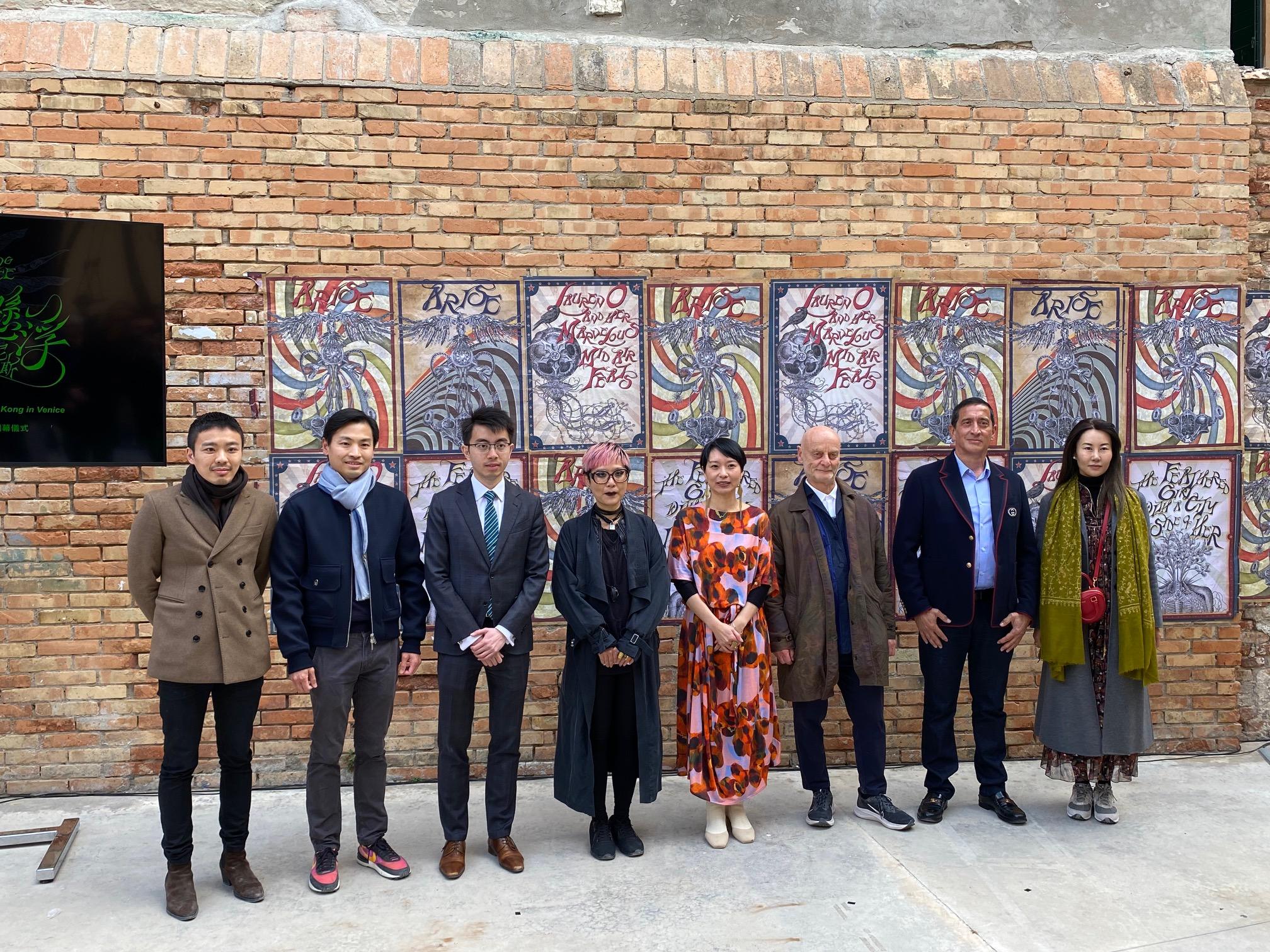 The Deputy Representative of the Hong Kong Economic and Trade Office in Brussels, Mr Henry Tsoi (third left), officiated at the opening reception of the Hong Kong Pavilion at the Venice Biennale in Venice on April 21 (Venice time), with the artist, Ms Angela Su (fourth left) and curator, Ms Freya Chou (fourth right), of the exhibition.
