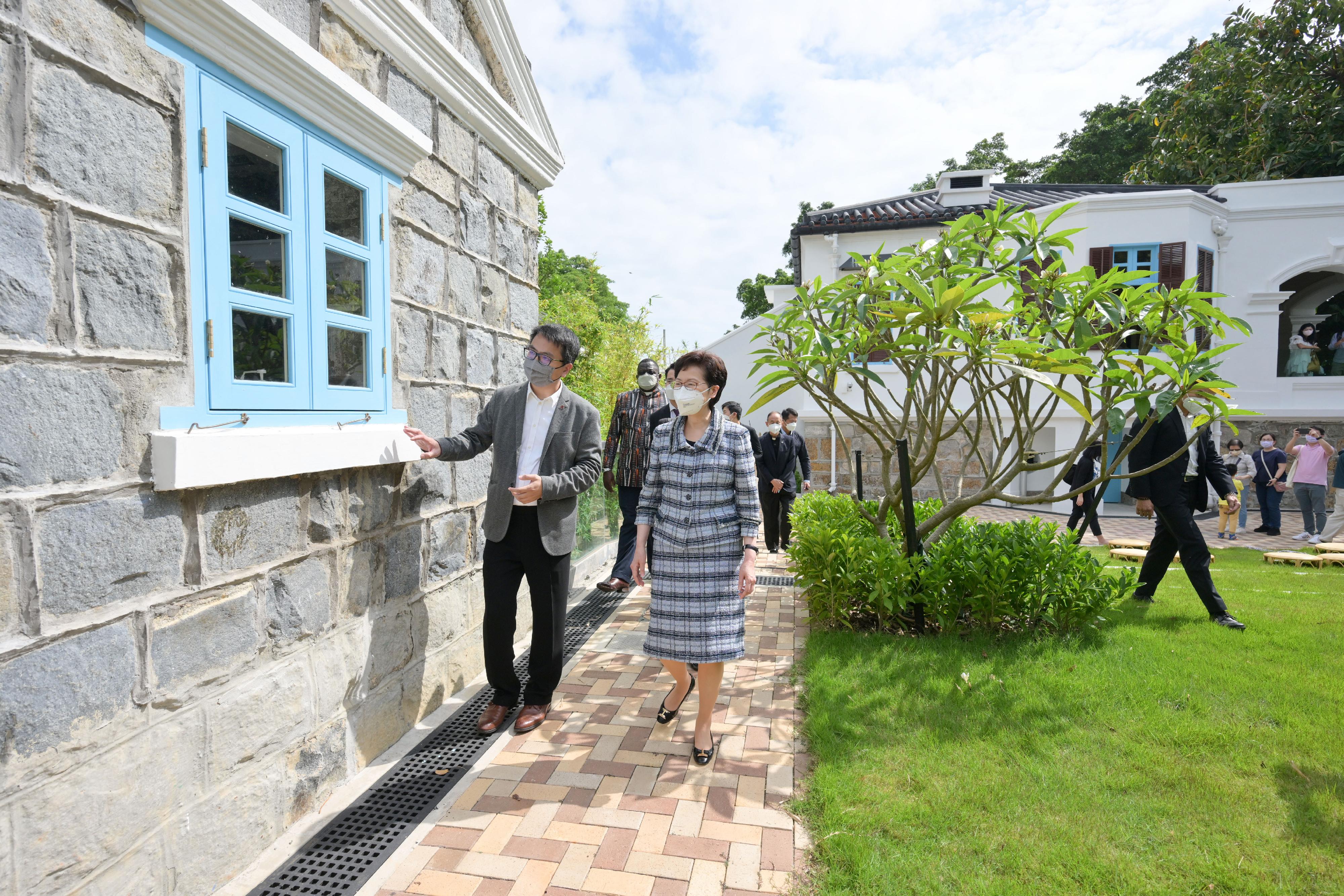 The Chief Executive, Mrs Carrie Lam (front row, right), today (April 22) visited The Pokfulam Farm to learn more about the revitalisation of the Old Dairy Farm Senior Staff Quarters in Pok Fu Lam under Batch IV of the Revitalising Historic Buildings Through Partnership Scheme.