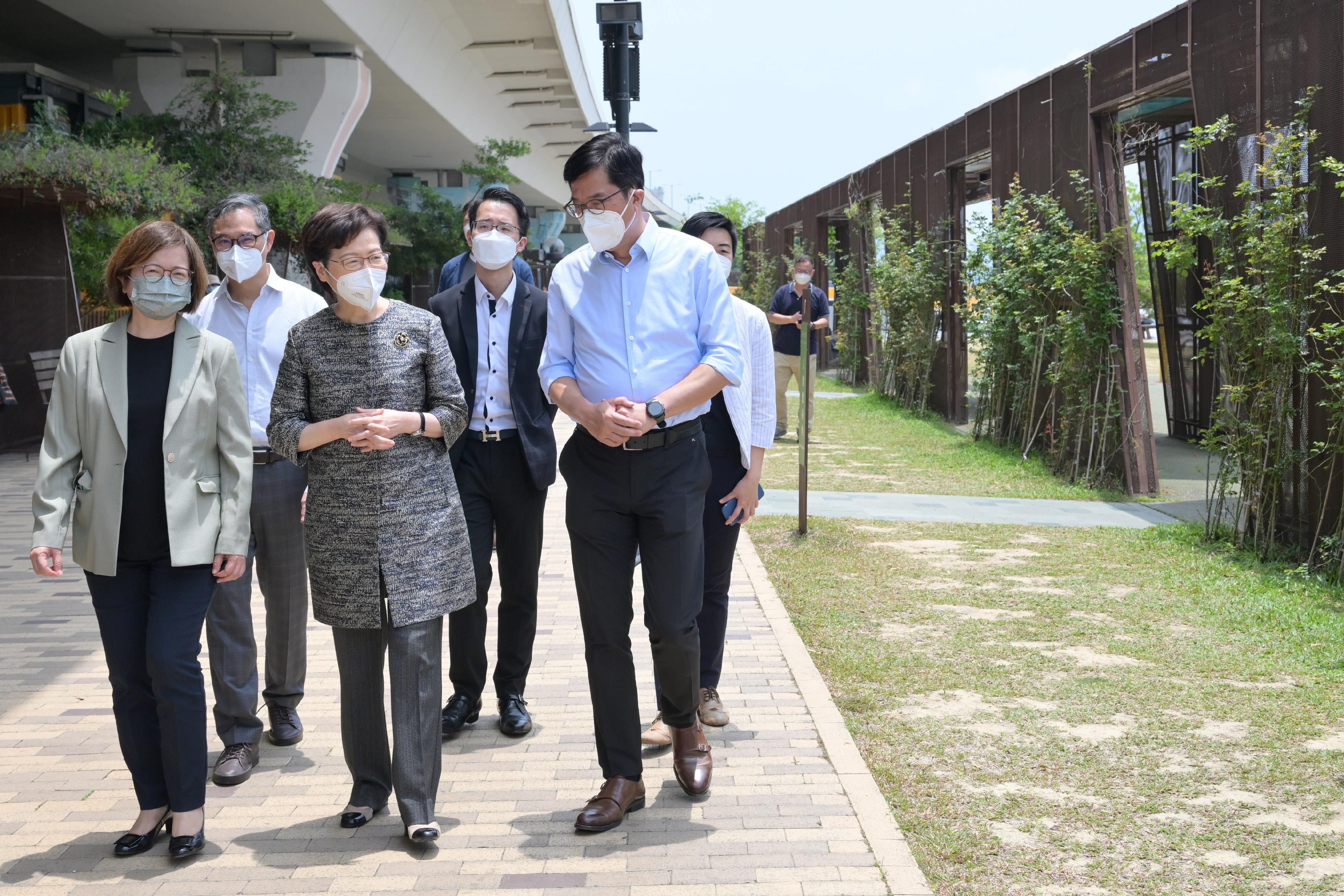 The Chief Executive, Mrs Carrie Lam, today (April 29) visited the Energizing Kowloon East Office (EKEO). Photo shows Mrs Lam (third left) touring the area to survey the latest developments of the Energizing Kowloon East initiative. Also present are the Secretary for Development, Mr Michael Wong (first right); the Permanent Secretary for Development (Works), Mr Ricky Lau (second left); and the Head of the EKEO, Ms Amy Cheung (first left).