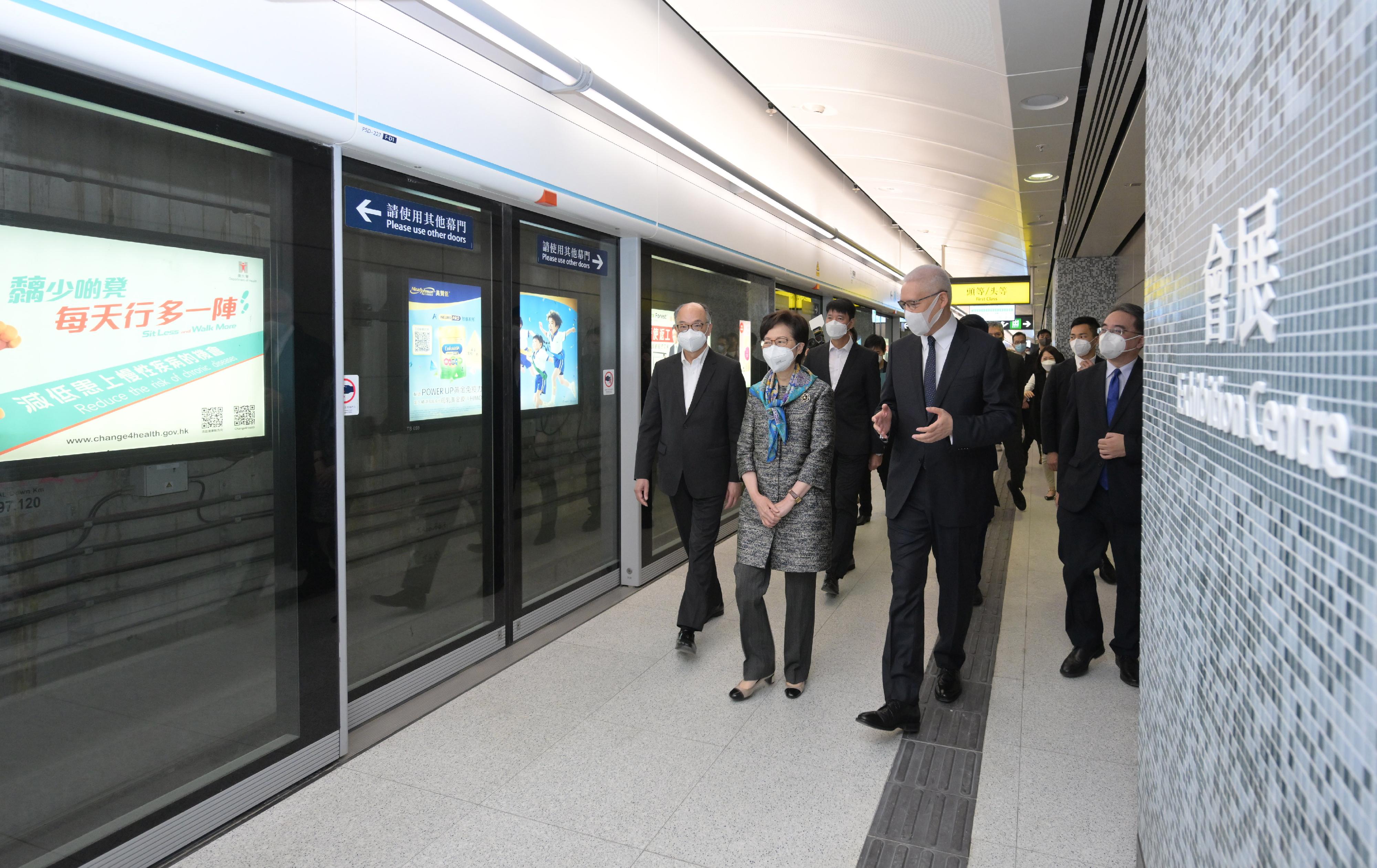 The Chief Executive, Mrs Carrie Lam, visited Wan Chai North today (May 4) to view the newly constructed Exhibition Centre Station of the East Rail Line cross-harbour extension and the neighbouring facilities. Photo shows Mrs Lam (second left) visiting the station's platform. Looking on are the Secretary for Transport and Housing, Mr Frank Chan Fan (first left); the Director of Highways, Mr Jimmy Chan (third left); the Chairman of the MTR Corporation Limited (MTRCL), Dr Rex Auyeung (fourth left); and the Chief Executive Officer of the MTRCL, Dr Jacob Kam (first right).