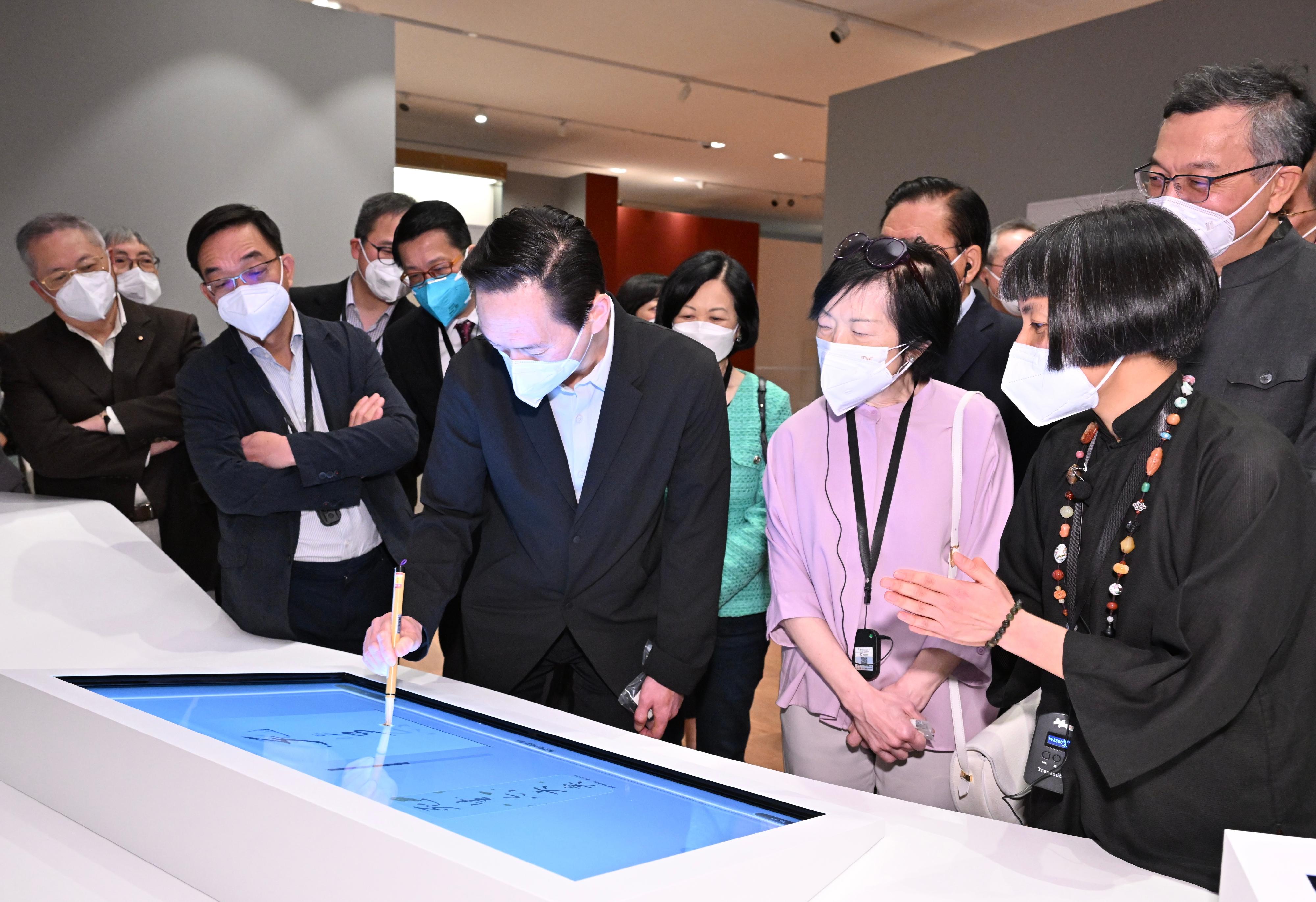 Non-official Members of the Executive Council today (May 5) visit the Hong Kong Palace Museum at the West Kowloon Cultural District.