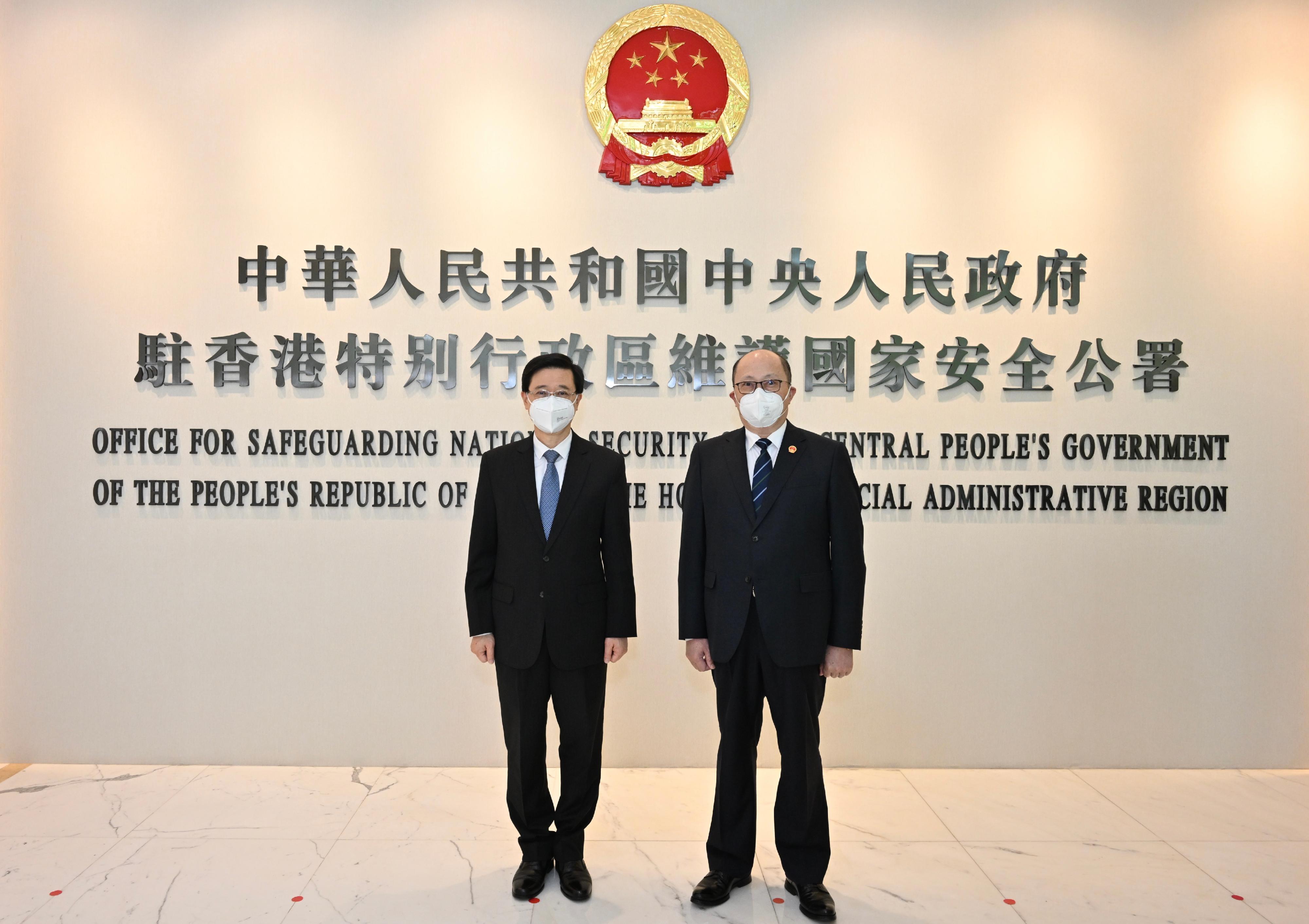 The Chief Executive-elect, Mr John Lee (left), pays a courtesy call on the Head of the Office for Safeguarding National Security of the Central People's Government in the Hong Kong Special Administrative Region, Mr Zheng Yanxiong, this afternoon (May 9).