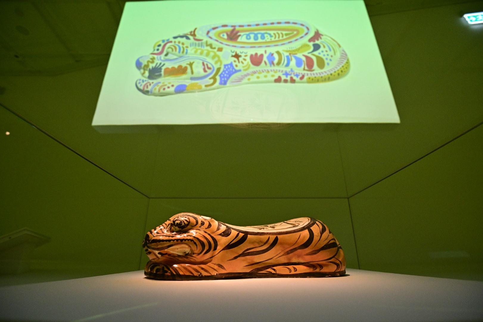 A wide array of new exhibitions are being held in the Hong Kong Museum of Art (HKMoA) to enable visitors to explore more stories that might have been out of the spotlight under the museum's four core collections. The exhibition "In-Between" is being held at the Wing on the ground floor and first floor of the HKMoA. Picture shows a tiger-shaped pillow painted in black and yellow on white ground, of the Cizhou type of Shanxi, from the Jin dynasty (donated by Mr Lee Luen-fai).