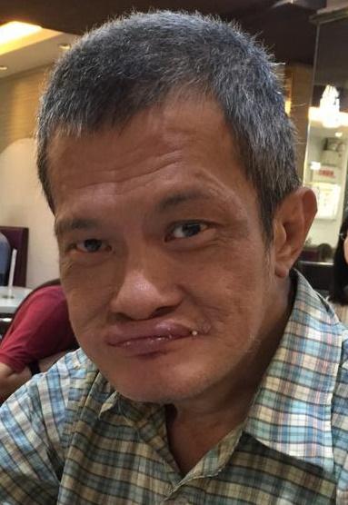 Kwok Hon-wah, aged 59, is about 1.6 metres tall, 50 kilograms in weight and of thin build. He has a round face with yellow complexion and short grey hair. He was last seen wearing a raincoat, a blue polo shirt, black trousers and black sports shoes.