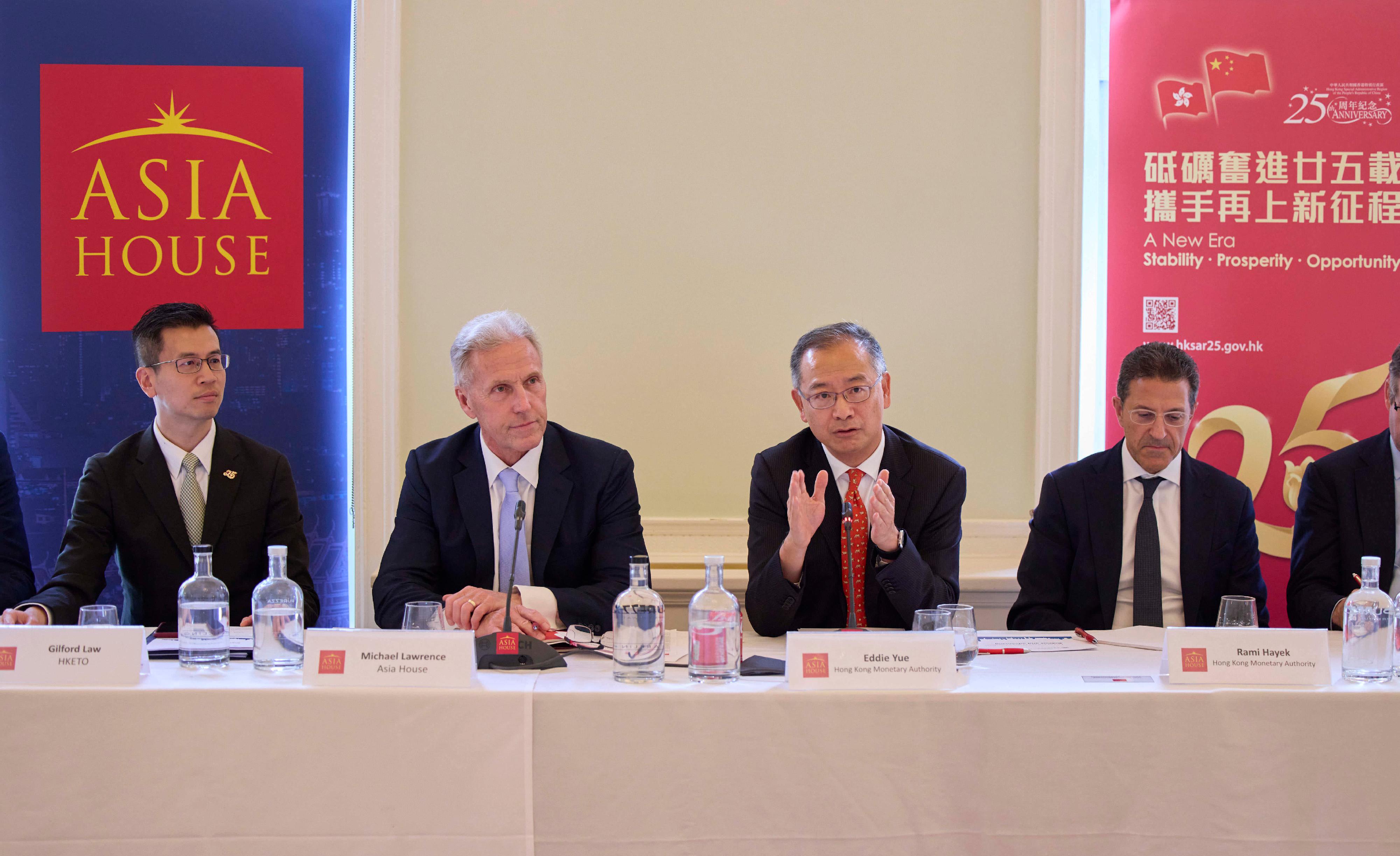 The Hong Kong Economic and Trade Office, London (London ETO), partnered with the Asia House on May 12 (London time) to hold a seminar for leaders in UK’s financial services sector.  The Chief Executive of the Hong Kong Monetary Authority, Mr Eddie Yue (third left), gave a keynote speech. Looking on are the Director-General of the London ETO, Mr Gilford Law (first left), and the Chief Executive of the Asia House, Mr Michael Lawrence (second left).