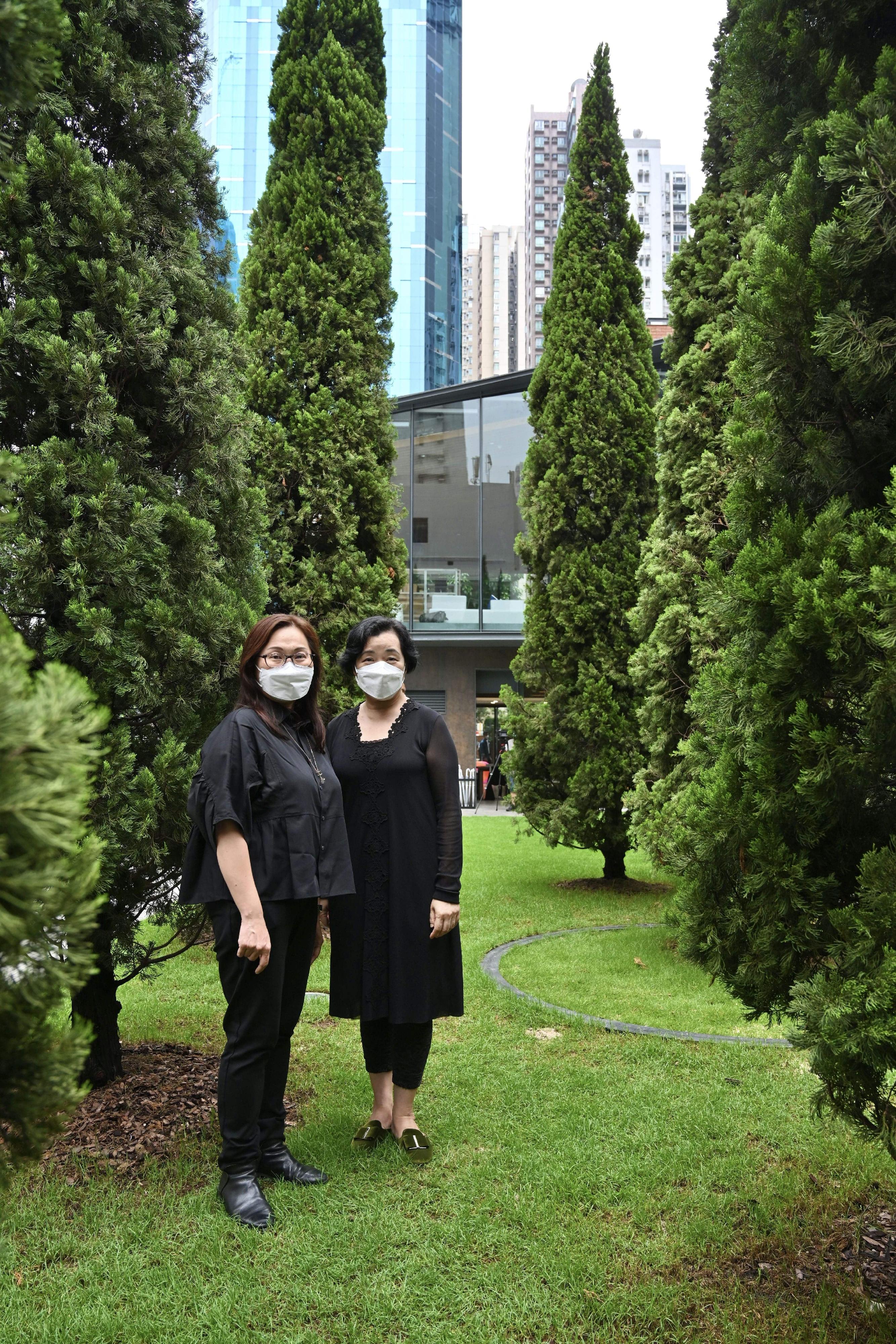 The new extension of the Oil Street Art Space (Oi!) will be open to the public tomorrow (May 24). Photo shows the Head of the Art Promotion Office, Dr Lesley Lau (right), with the Curator of Oi!, Ms Joan Chung (left), at the "Joyful Trees (Arbores Laetae)" installation.