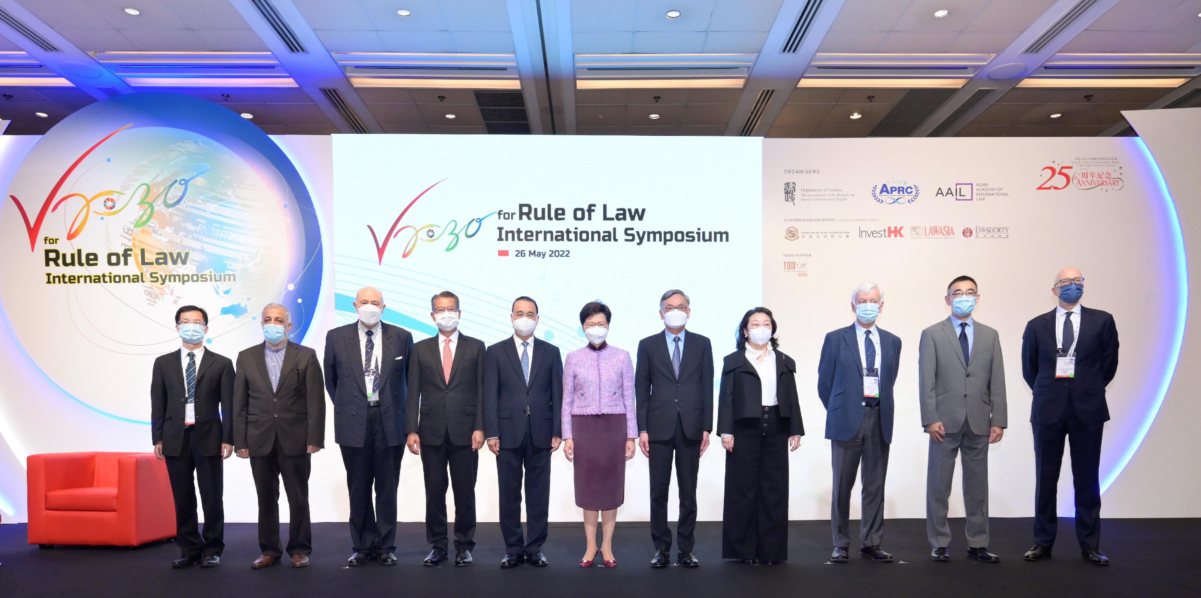 The Chief Executive, Mrs Carrie Lam, attended the Vision 2030 for Rule of Law International Symposium today (May 26). Photo shows (from third left) the Chairman of the Asian Academy of International Law, Dr Anthony Neoh; the Financial Secretary, Mr Paul Chan; the Commissioner of the Ministry of Foreign Affairs of the People's Republic of China in the Hong Kong Special Administrative Region, Mr Liu Guangyuan; Mrs Lam; the Chief Justice of the Court of Final Appeal, Mr Andrew Cheung Kui-nung; the Secretary for Justice, Ms Teresa Cheng, SC, and other speakers at the event.