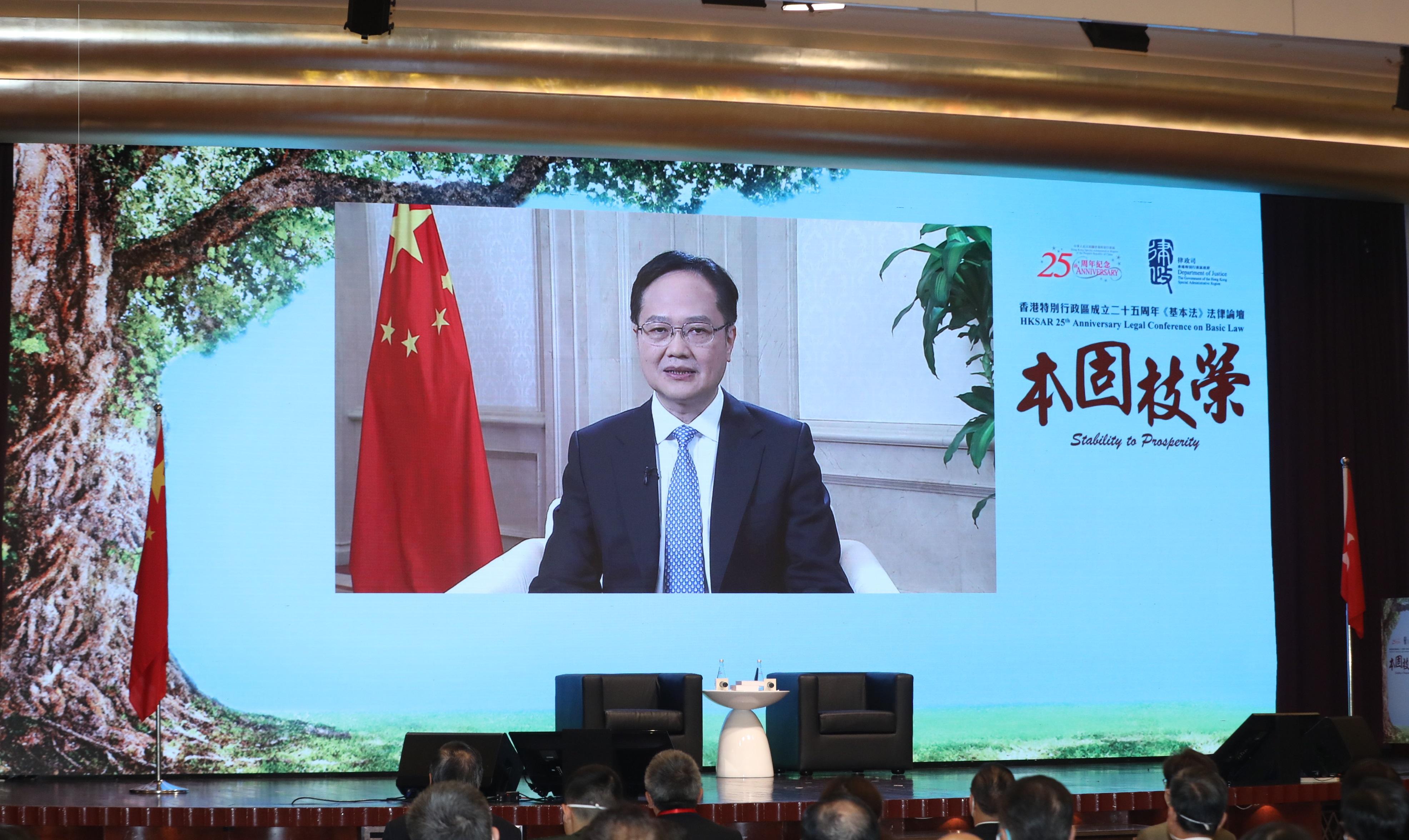 The Hong Kong Special Administrative Region (HKSAR) 25th Anniversary Legal Conference on Basic Law "Stability to Prosperity" was hosted by the Department of Justice today (May 27). Photo shows Deputy Director of the Liaison Office of the Central People's Government in the HKSAR Mr Chen Dong delivering welcome remarks at the opening ceremony.