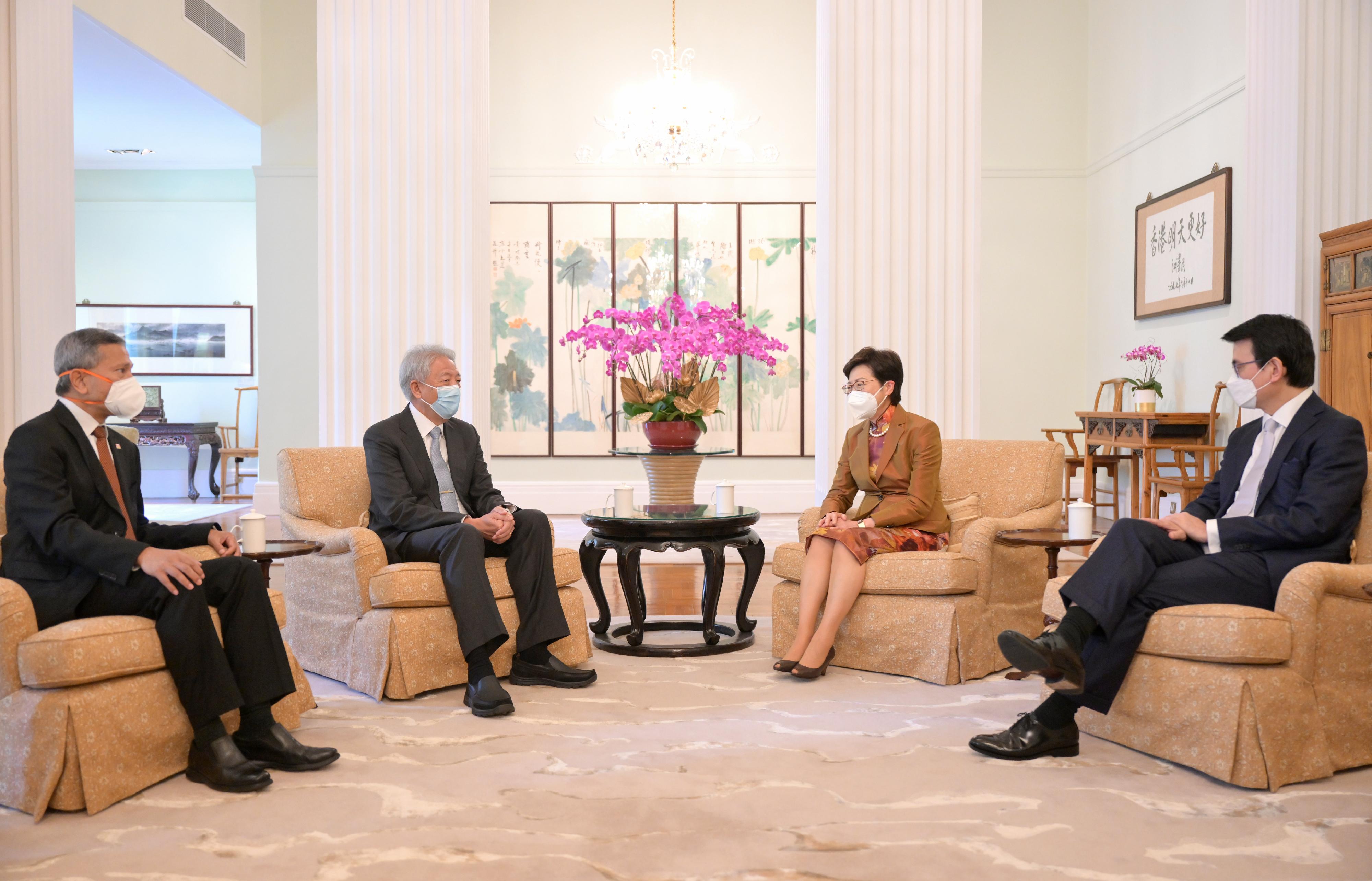 The Chief Executive, Mrs Carrie Lam (second right), accompanied by the Secretary for Commerce and Economic Development, Mr Edward Yau (first right), met with the Senior Minister and Coordinating Minister for National Security of Singapore, Mr Teo Chee Hean (second left), and the Minister for Foreign Affairs of Singapore, Dr Vivian Balakrishnan (first left), at Government House today (May 30).