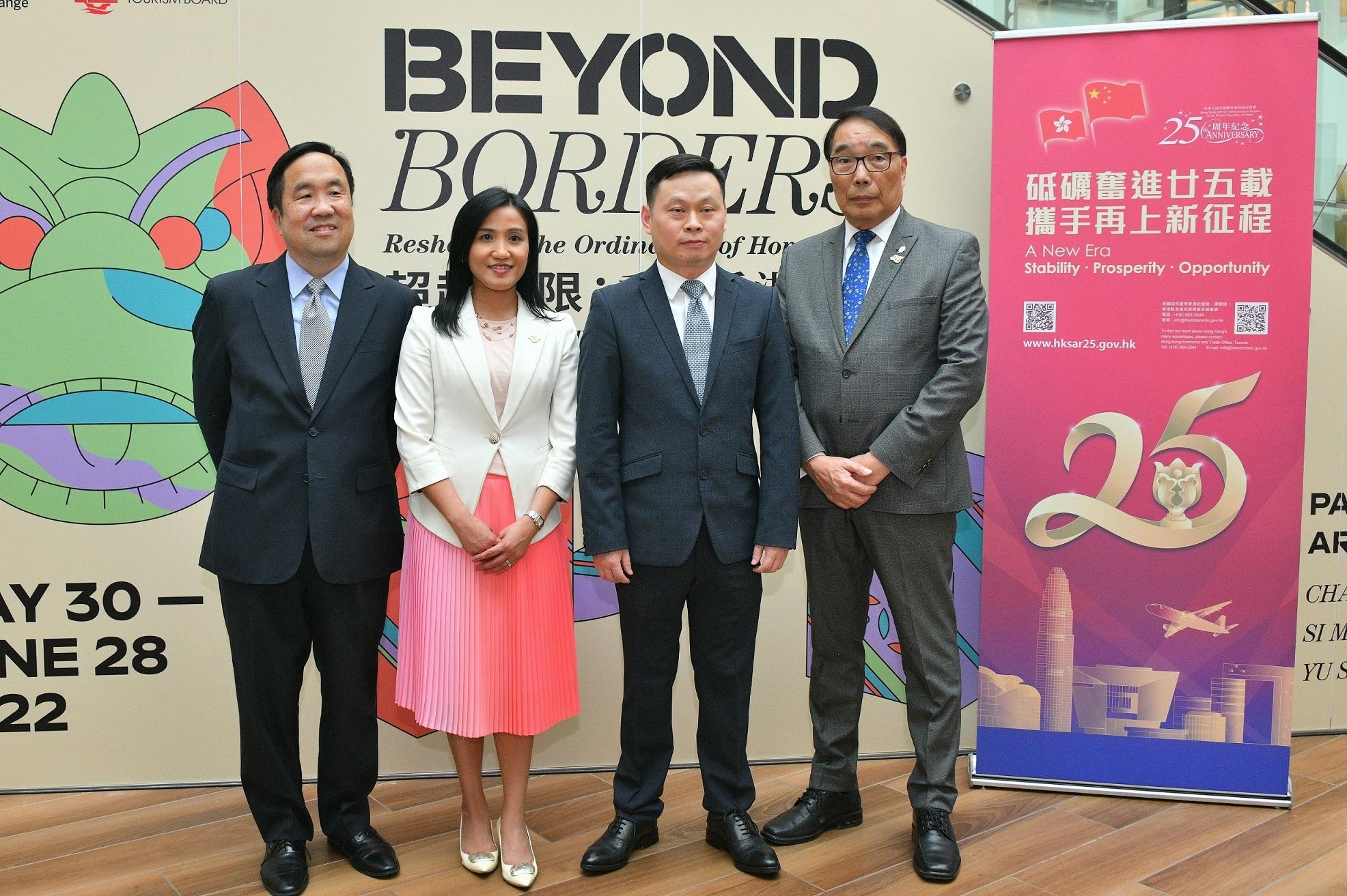 The Director of the Hong Kong Economic and Trade Office (Toronto), Ms Emily Mo (second left), officiates at the opening ceremony of the "Beyond Borders: Reshaping the Ordinaries of Hong Kong" art exhibition yesterday (June 1, Toronto time), and is pictured with Deputy Consul General of the People's Republic of China in Toronto Mr Cheng Hongbo (second right); the Director of Canada, Central and South America of the Hong Kong Tourism Board, Mr Michael Lim (first left); and the Founder of the CanAsia Creative Exchange, Mr Stephen Siu (first right).
