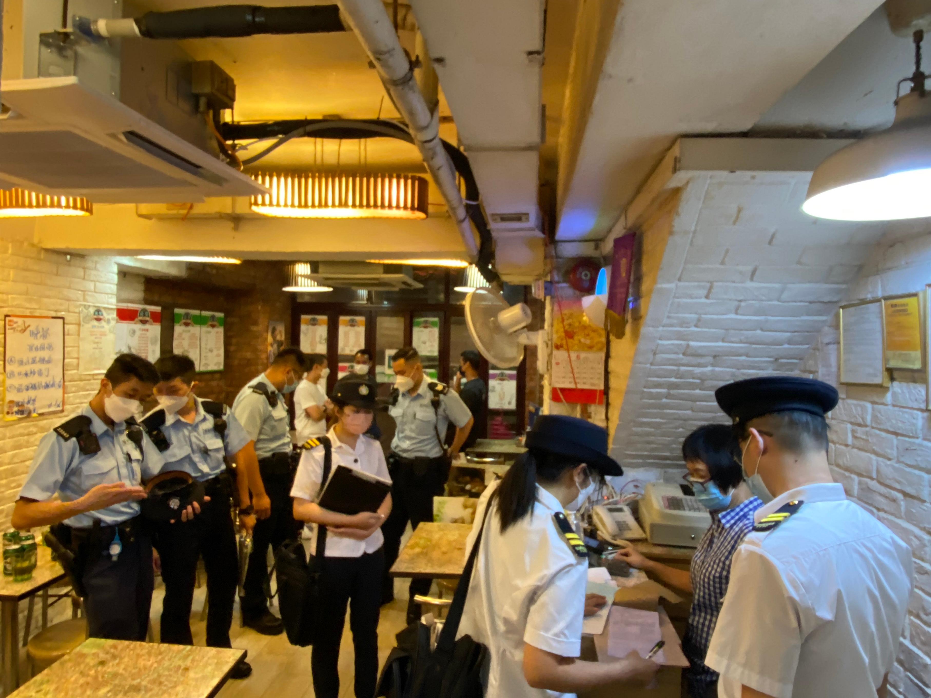 The Food and Environmental Hygiene Department conducted joint operations during the long weekend with the Police in Mong Kok and inspected catering premises.
