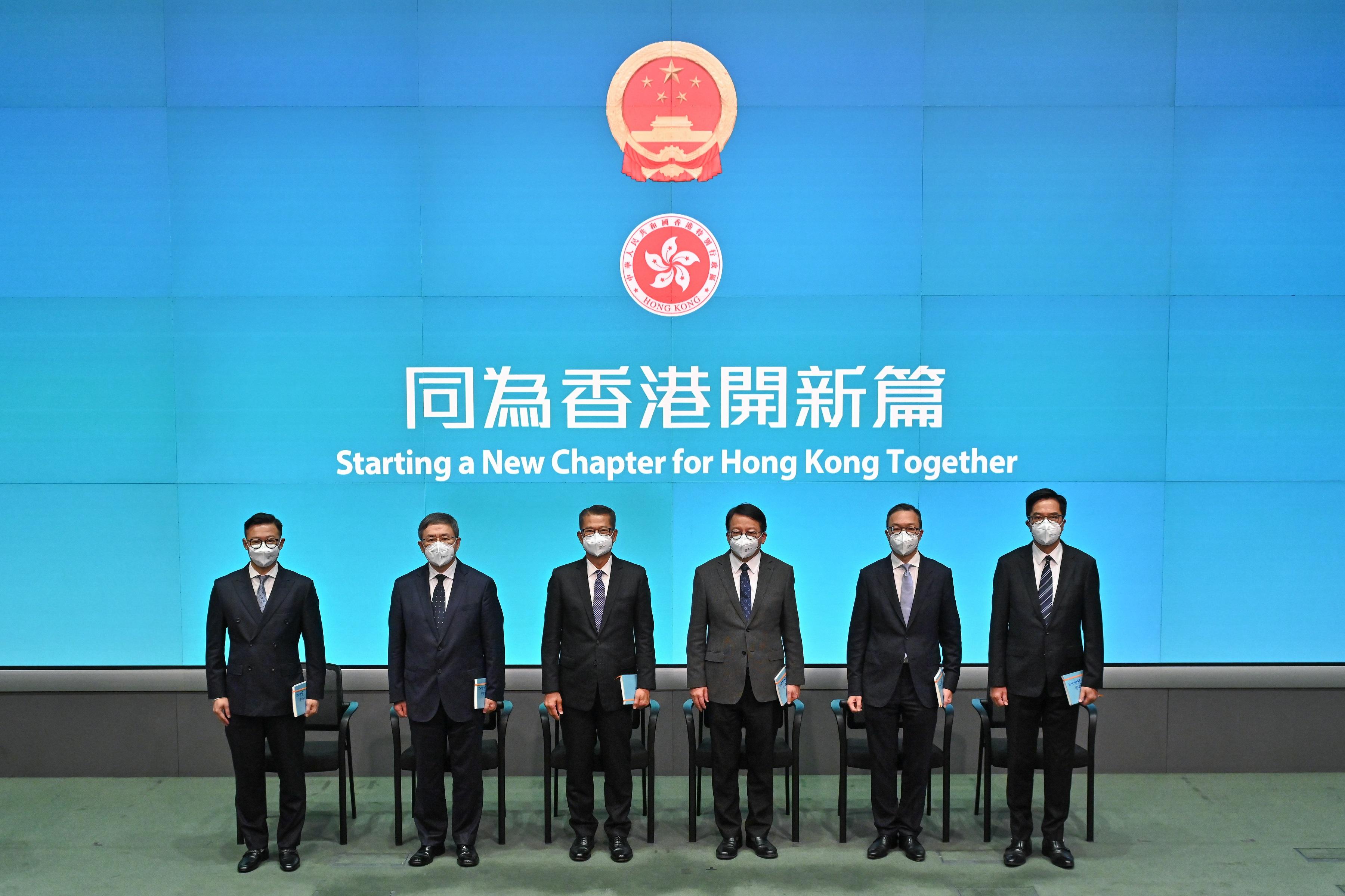 Principal Officials of the sixth-term of the Hong Kong Special Administrative Region Government, the Chief Secretary for Administration (designate), Mr Chan Kwok-ki (third right); the Financial Secretary (designate), Mr Paul Chan (third left); the Secretary for Justice (designate), Mr Paul Lam Ting-kwok, SC (second right); the Deputy Chief Secretary for Administration (designate), Mr Cheuk Wing-hing (second left); the Deputy Financial Secretary (designate), Mr Michael Wong (first right), and the Deputy Secretary for Justice (designate), Mr Cheung Kwok-kwan (first left), meet the media today (June 19).