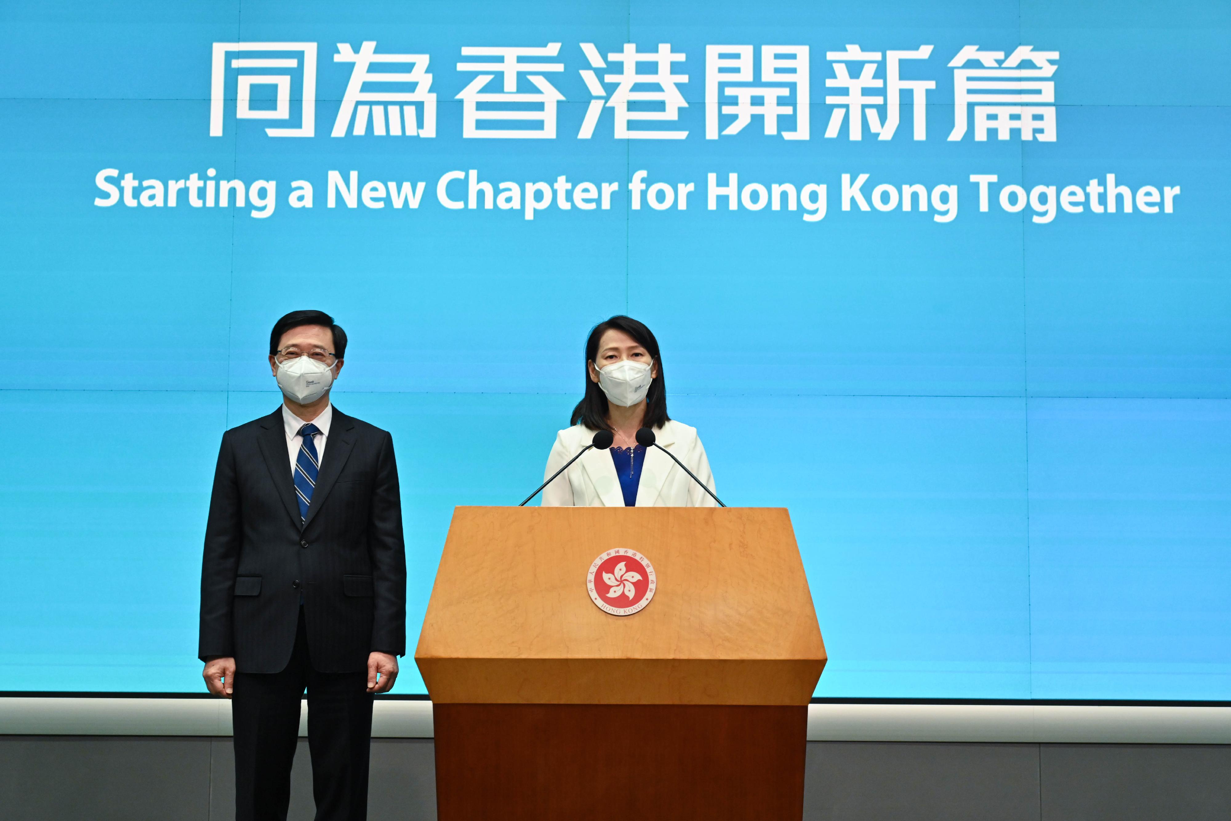 The Chief Executive-elect, Mr John Lee (left), and the Director of the Chief Executive's Office (designate), Ms Carol Yip, meet the media at the press conference on the appointment of Principal Officials for the sixth-term Hong Kong Special Administrative Region Government today (June 19).