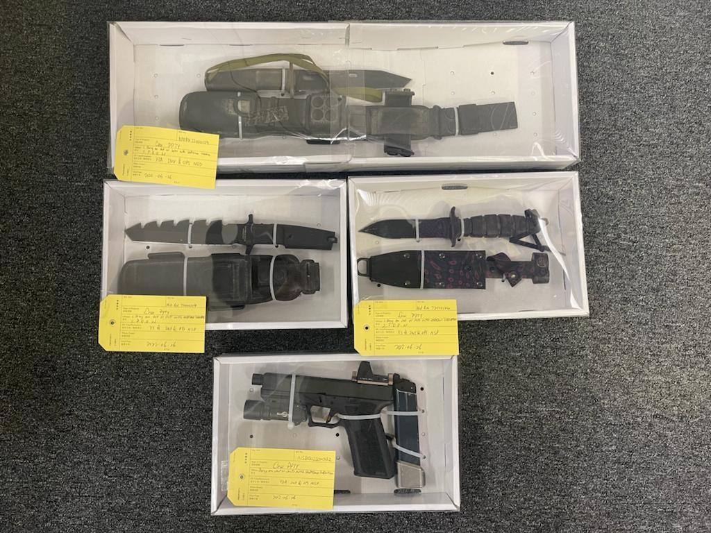 The National Security Department of the Hong Kong Police Force today (June 26) arrested two men, aged 31 and 53 respectively. Photo shows the military knives and an imitation firearm seized.
