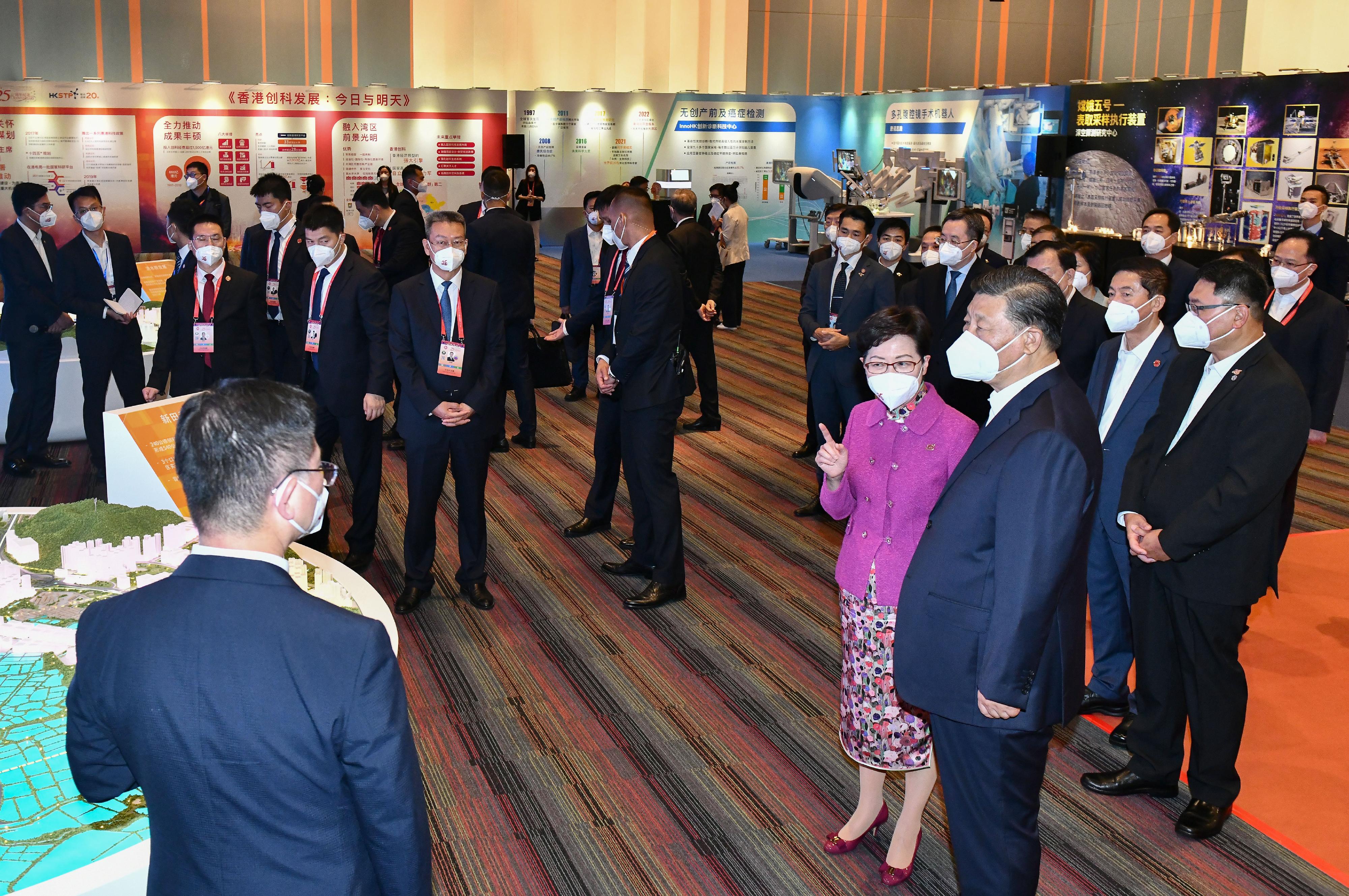 President Xi Jinping (front, first right), accompanied by the Chief Executive, Mrs Carrie Lam (front, second right), visited the Hong Kong Science Park to inspect the development of innovation and technology in Hong Kong today (June 30). 