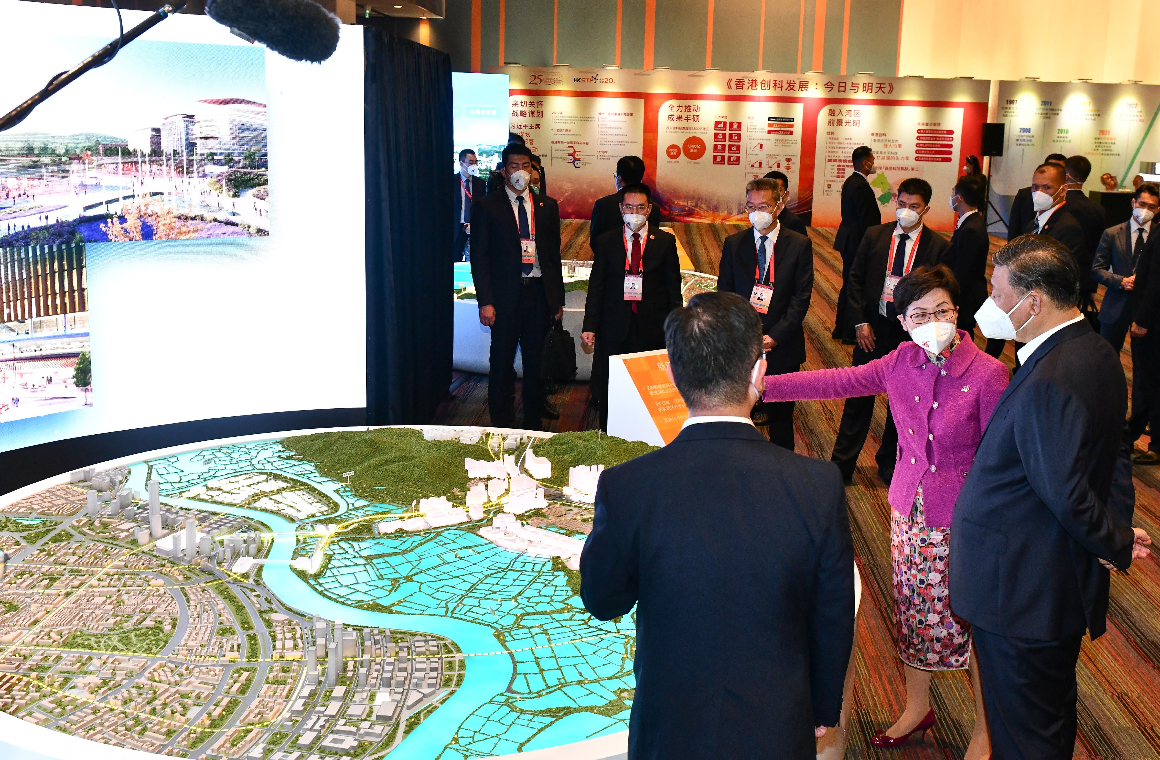 President Xi Jinping visited the Hong Kong Science Park to inspect the development of innovation and technology (I&T) in Hong Kong today (June 30). Photo shows President Xi (first right), accompanied by the Chief Executive, Mrs Carrie Lam (second right), receiving a briefing from the Secretary for Innovation and Technology, Mr Alfred Sit (first left), on the overall I&T strengths and development in Hong Kong.