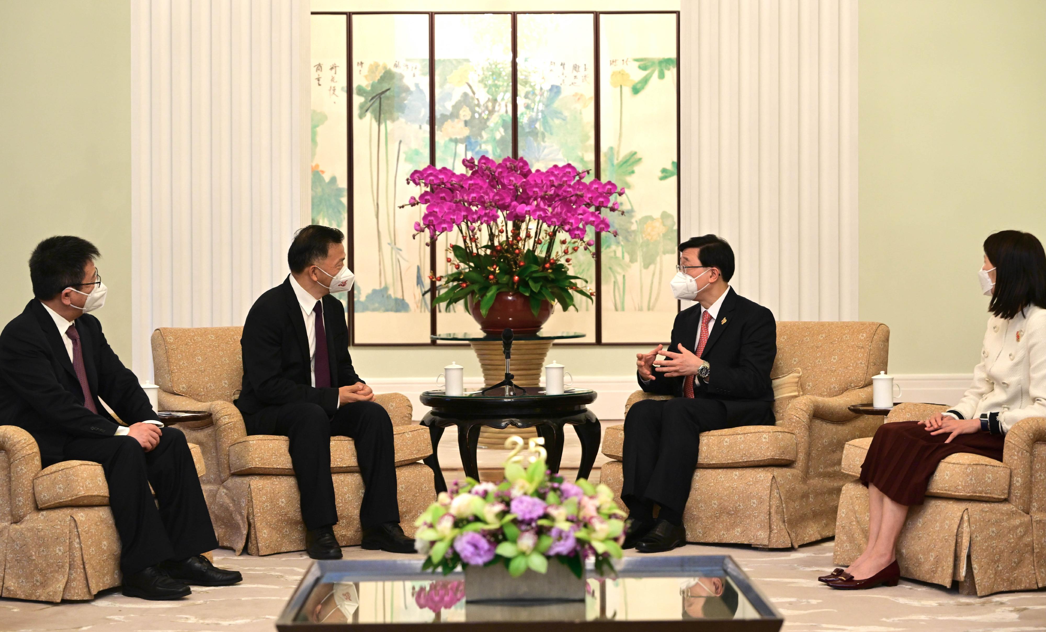 The Chief Executive, Mr John Lee (second right), met with the Vice Minister of the Publicity Department of the Communist Party of China Central Committee and President and Editor-in-Chief of China Media Group, Mr Shen Haixiong (second left), at Government House today (July 1). The Director of the Chief Executive's Office, Ms Carol Yip (first right), also attended the meeting.