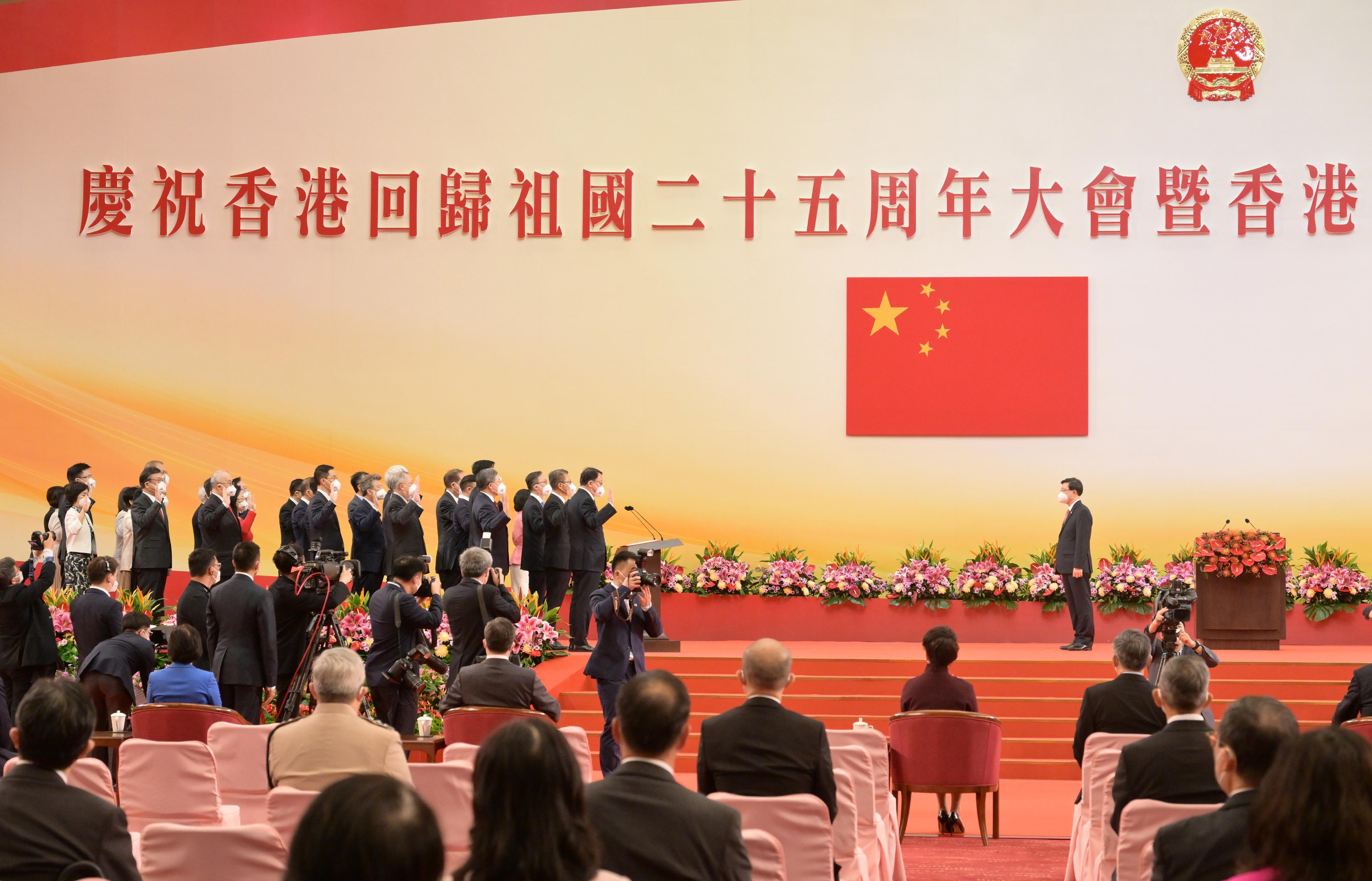 The Chief Executive, Mr John Lee (right), swears in members of the Executive Council at the Inaugural Ceremony of the Sixth-term Government of the Hong Kong Special Administrative Region at the Hong Kong Convention and Exhibition Centre this morning (July 1).