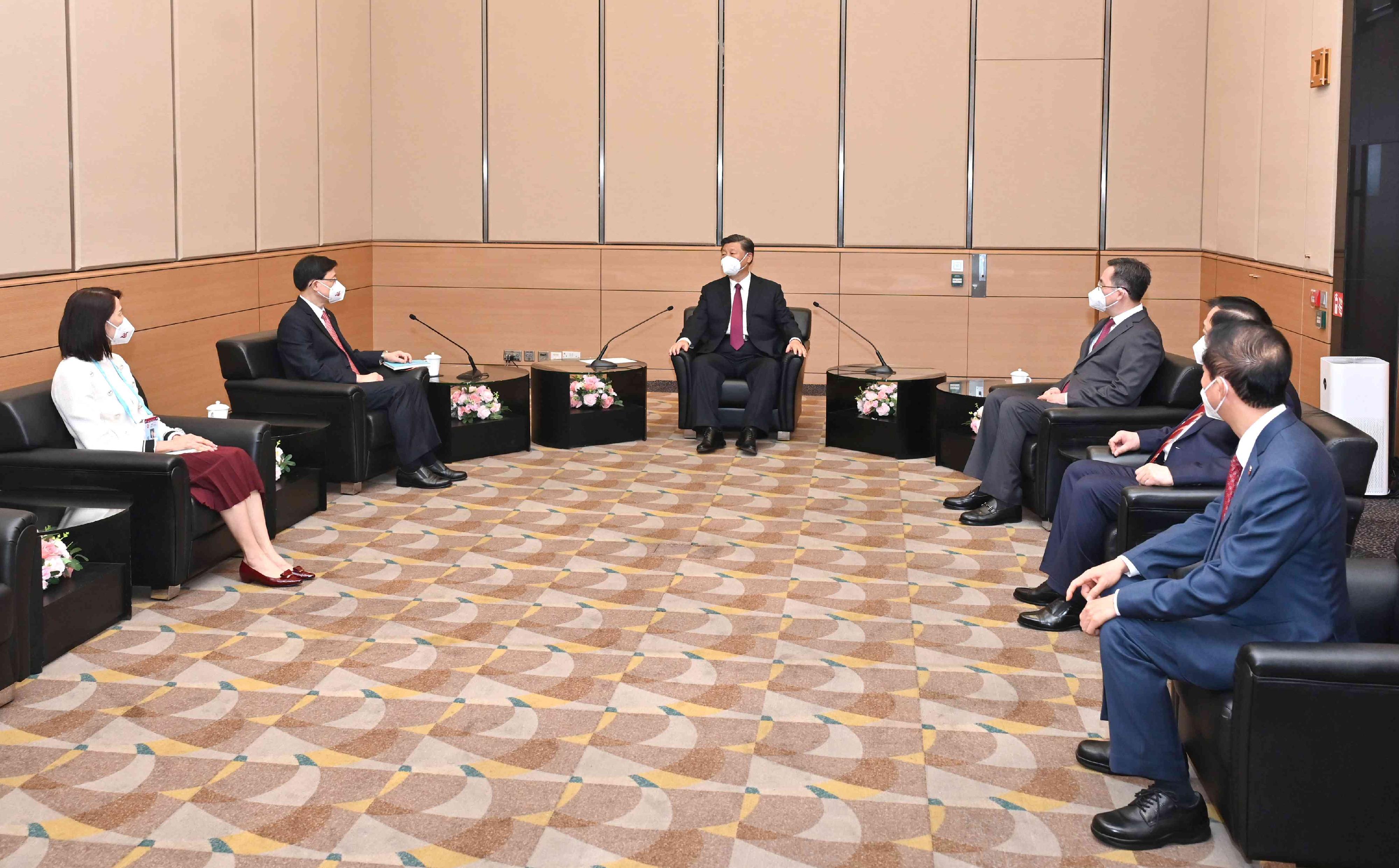 President Xi Jinping (third left) met with the new Chief Executive, Mr John Lee (second left), today (July 1) at the Hong Kong Convention and Exhibition Centre. Member of the Political Bureau of the Communist Party of China (CPC) Central Committee, Member of the Secretariat of the CPC Central Committee, and the Director of the General Office of the CPC Central Committee, Mr Ding Xuexiang (third right); Vice-Chairman of the National Committee of the Chinese People's Political Consultative Conference and the Director of the Hong Kong and Macao Affairs Office of the State Council, Mr Xia Baolong (second right); the Director of the Liaison Office of the Central People's Government in the Hong Kong Special Administrative Region, Mr Luo Huining (first right); and the new Director of the Chief Executive's Office, Ms Carol Yip (first left), were also present.
