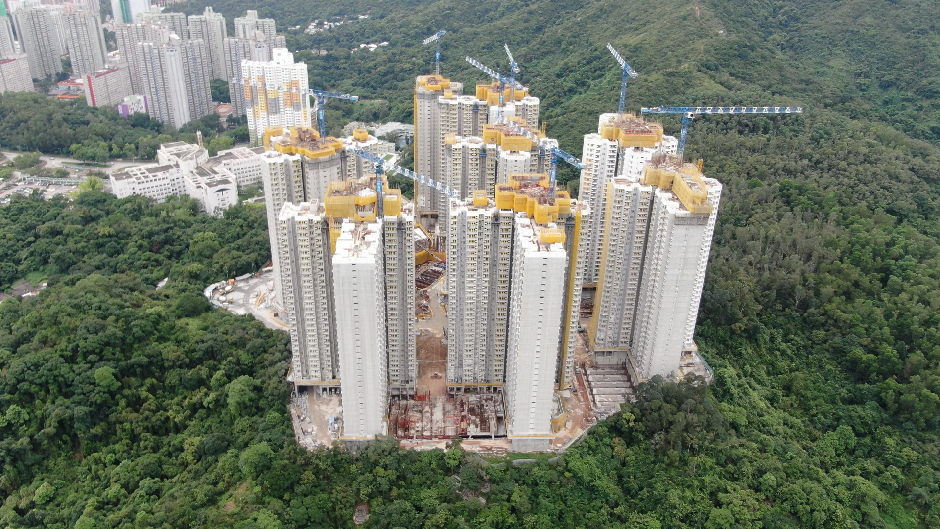 The Secretary for Housing, Ms Winnie Ho, visited Tai Po Area 9 this morning (July 7) to grasp the latest progress of the public rental housing development projects. Photo shows the aerial view of Fu Tip Estate, which is under construction.