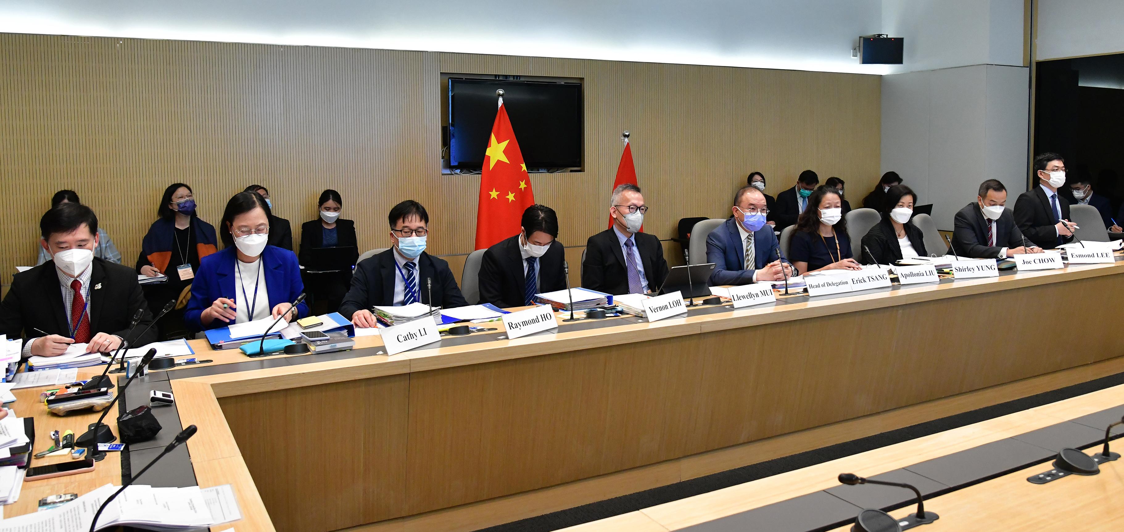 The Secretary for Constitutional and Mainland Affairs, Mr Erick Tsang Kwok-wai (front row, fifth right), led the delegation of the Hong Kong Special Administrative Region Government to attend the meeting of the United Nations Human Rights Committee by videoconferencing today (July 7). Photo shows (front row, from left) the Under Secretary for Constitutional and Mainland Affairs, Mr Clement Woo; the Principal Assistant Secretary (Constitutional and Mainland Affairs), Miss Cathy Li; the Deputy Commissioner for Labour (Labour Administration), Mr Raymond Ho; the Senior Assistant Solicitor General (Human Rights), Mr Vernon Loh; the Acting Solicitor General, Mr Llewellyn Mui; Mr Tsang; Deputy Secretary for Security Mrs Apollonia Liu; Deputy Secretary for Security Miss Shirley Yung; the Deputy Commissioner of Police (Management), Mr Joe Chow; and Deputy Secretary for Education Mr Esmond Lee attending the meeting.