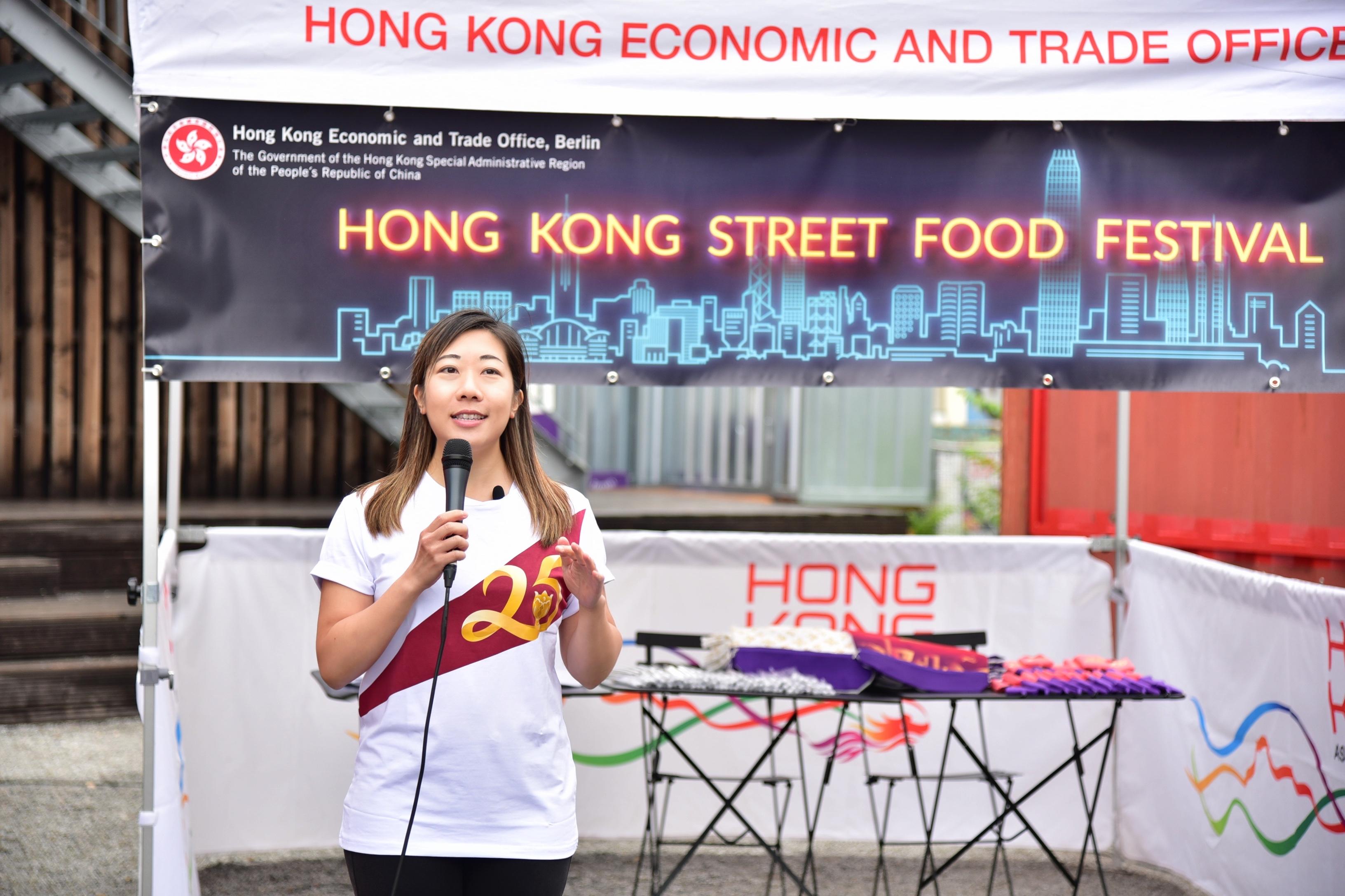 The Director of the Hong Kong Economic and Trade Office, Berlin, Ms Jenny Szeto, speaks at the Hong Kong Street Food Festival pavilion in Berlin, Germany, on July 7 (Berlin time).