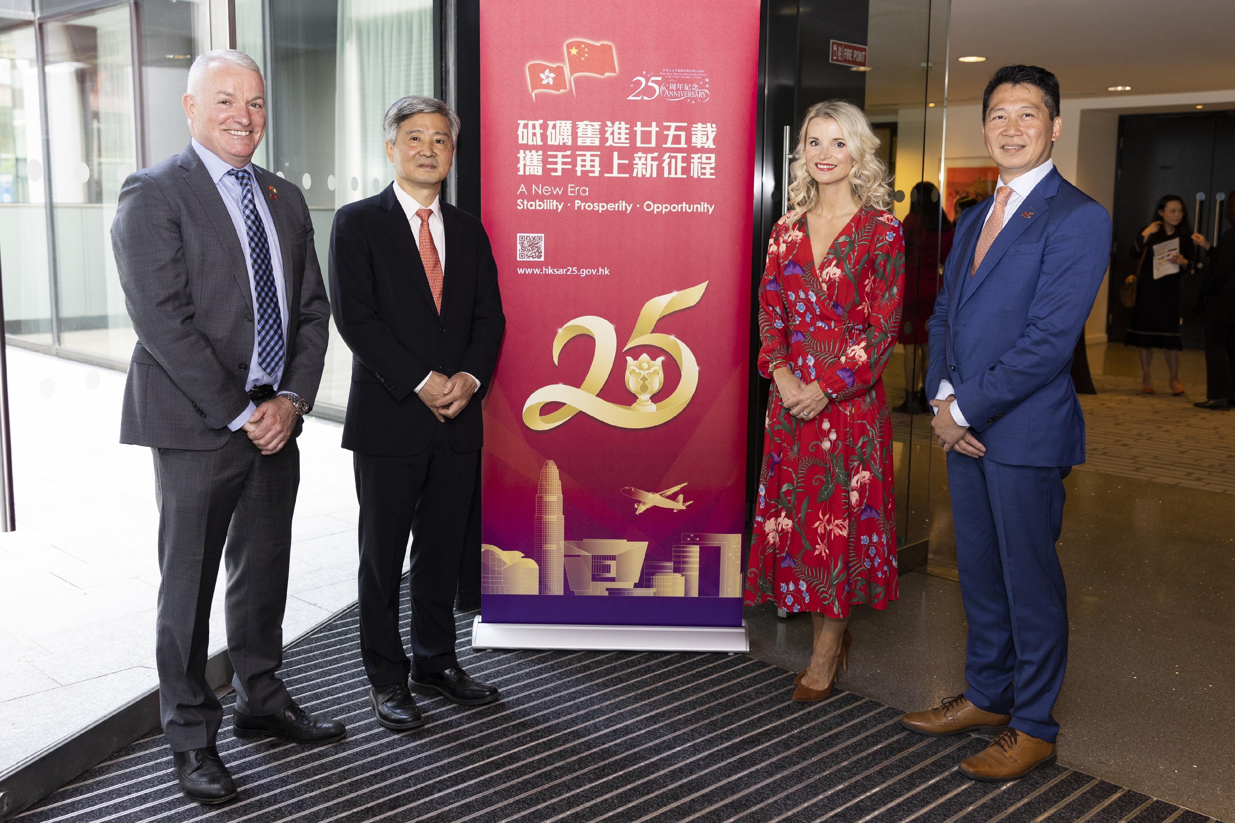 The Special Representative for Hong Kong Economic and Trade Affairs to the European Union, Mr Eddie Cheung (first right), joins a photo with the Chinese Ambassador to Ireland, Mr He Xiangdong (second left), and the co-organisers of the business luncheon in Dublin, Ireland, on June 15 (Dublin time) to celebrate the 25th anniversary of the establishment of the Hong Kong Special Administrative Region including the Chair of the Ireland Hong Kong Business Forum, Mr Brendan Foster (first left), and the Deputy Vice President of the Dublin Chamber of Commerce, Ms Siobhan O'Shea (second right).