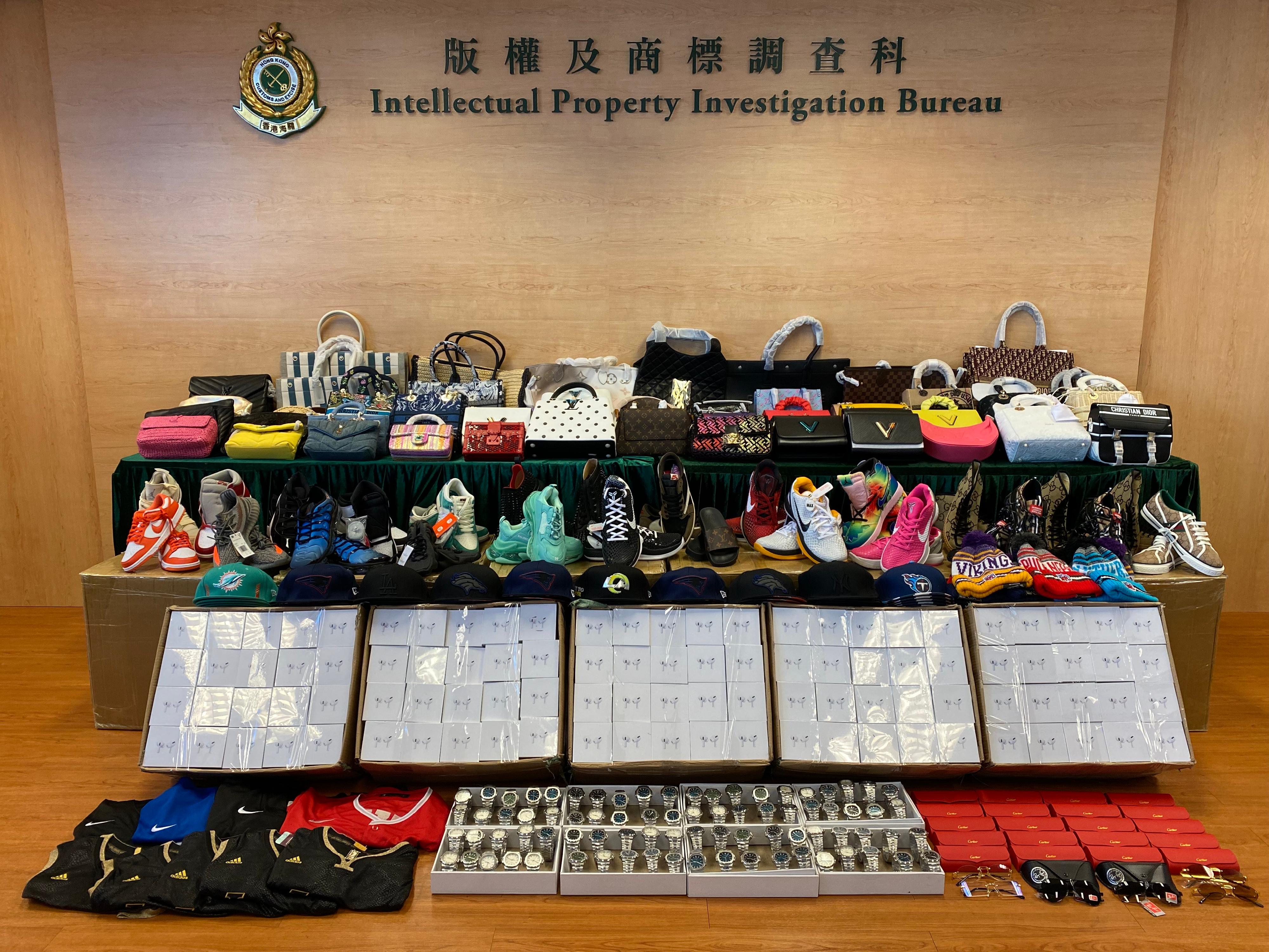 Hong Kong Customs seized about 2 800 items of suspected counterfeit goods with a total estimated market value of about $4.1 million at Man Kam To Control Point, Yuen Long and Kwai Chung from July 5 to 8. Photo shows some of the suspected counterfeit goods seized by Customs officers in Yuen Long and Kwai Chung.