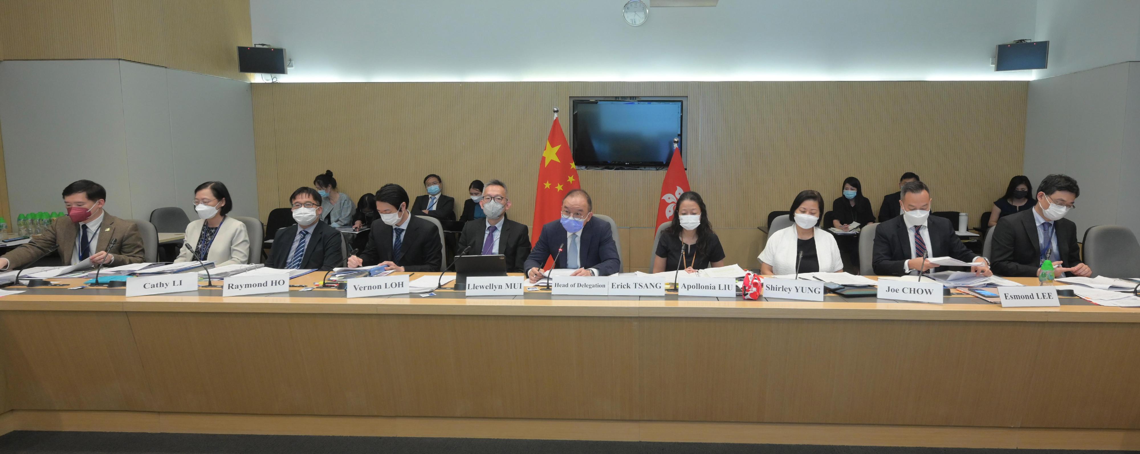 The Secretary for Constitutional and Mainland Affairs, Mr Erick Tsang Kwok-wai (front row, fifth right), led the delegation of the Hong Kong Special Administrative Region Government to attend the meeting of the United Nations Human Rights Committee by videoconferencing today (July 12). Photo shows (front row, from left) the Under Secretary for Constitutional and Mainland Affairs, Mr Clement Woo; the Principal Assistant Secretary (Constitutional and Mainland Affairs), Miss Cathy Li; the Deputy Commissioner for Labour (Labour Administration), Mr Raymond Ho; the Senior Assistant Solicitor General (Human Rights), Mr Vernon Loh; the Acting Solicitor General, Mr Llewellyn Mui; Mr Tsang; Deputy Secretary for Security Mrs Apollonia Liu; Deputy Secretary for Security Miss Shirley Yung; the Deputy Commissioner of Police (Management), Mr Joe Chow; and Deputy Secretary for Education Mr Esmond Lee attending the meeting.