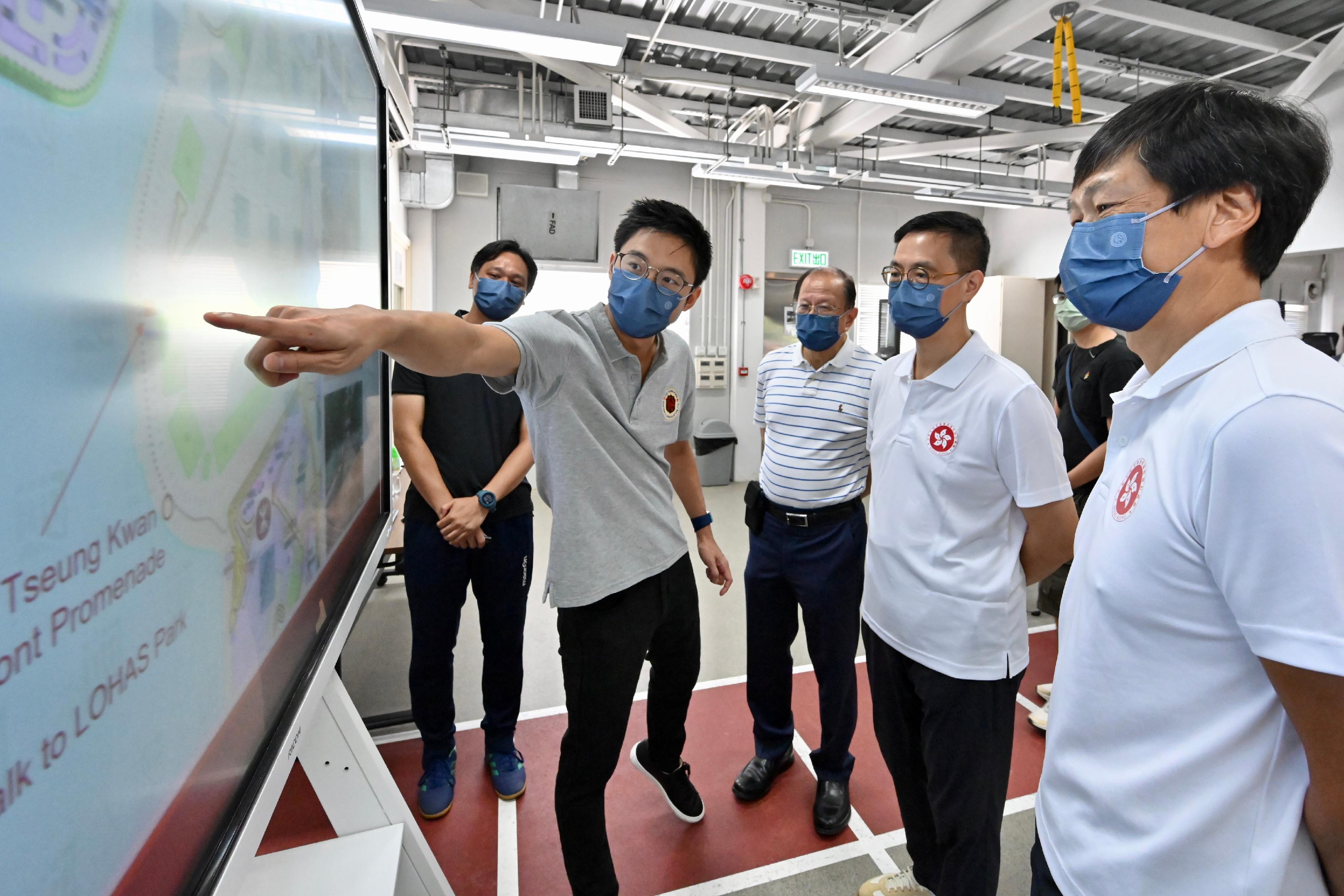 The Secretary for Culture, Sports and Tourism, Mr Kevin Yeung, visited the Jockey Club Hong Kong Football Association (HKFA) Football Training Centre today (July 13). Photo shows Mr Yeung (second right) being briefed by the HKFA Vice Chairman, Mr Eric Fok (second left), on the HKFA’s work on promoting football development.