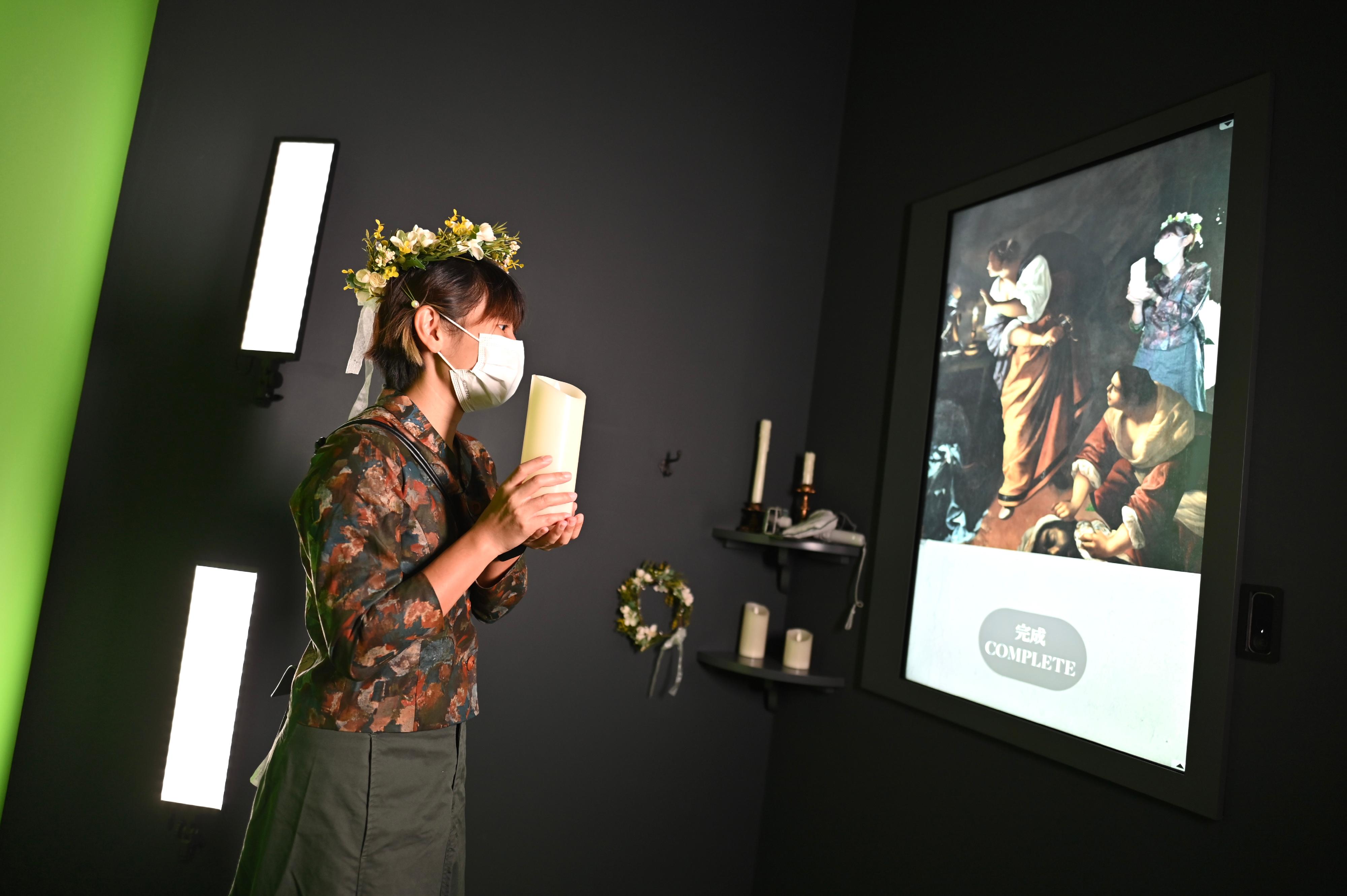 "The Hong Kong Jockey Club Series: The Road to the Baroque - Masterpieces from the Capodimonte Museum" exhibition will be held from tomorrow (July 15) at the Hong Kong Museum of Art. Picture shows an interactive installation at the education corner, where visitors can become part of a Baroque painting.