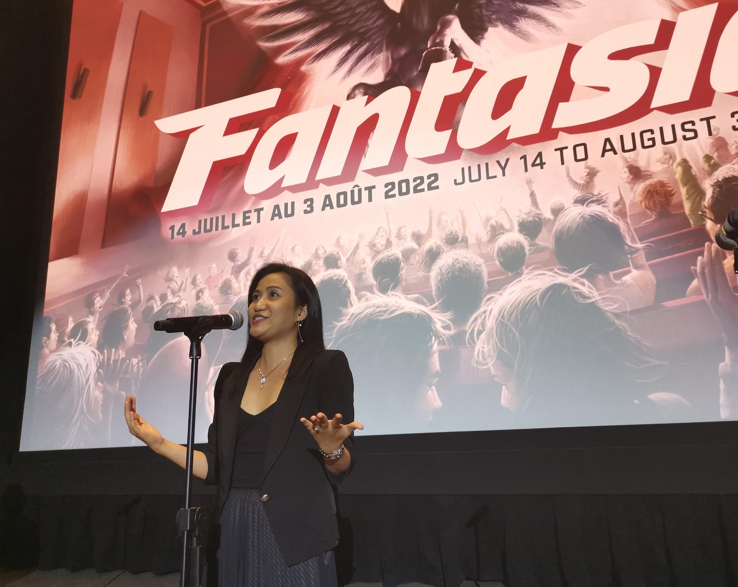 The Director of the Hong Kong Economic and Trade Office (Toronto), Ms Emily Mo, speaks before the screening of the movie "Hard Boiled" directed by Hong Kong Director Mr John Woo at the Concordia Hall Theatre in Montreal, Canada, on July 15 (Montreal time).
