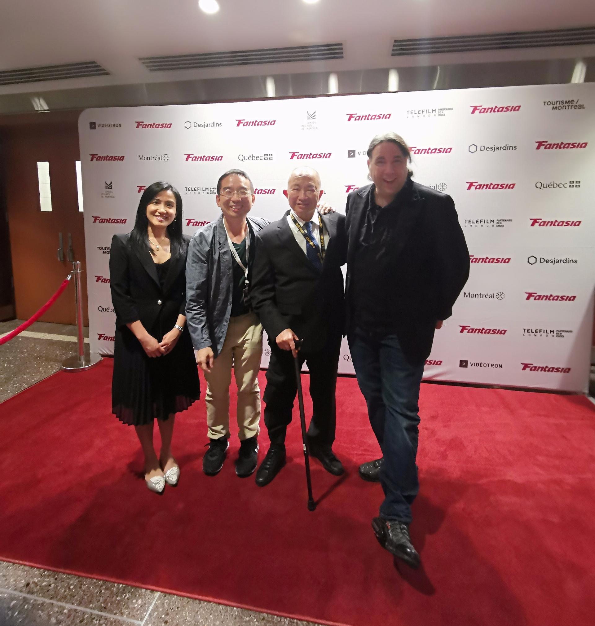 The Hong Kong Economic and Trade Office (Toronto) (Toronto ETO) supported the screening of seven Hong Kong films at the 26th Fantasia International Film Festival held from July 14 to August 3 in Montreal, Canada. Photo shows (from left) the Director of the Toronto ETO, Ms Emily Mo, the Co-director of Asian Programming, Fantasia International Film Festival, Mr King-wei Chu, Hong Kong Director, Mr John Woo, and the Artistic Director of Fantasia International Film Festival, Mr Mitch Davis at Concordia Hall Theatre on July 15 (Montreal time).