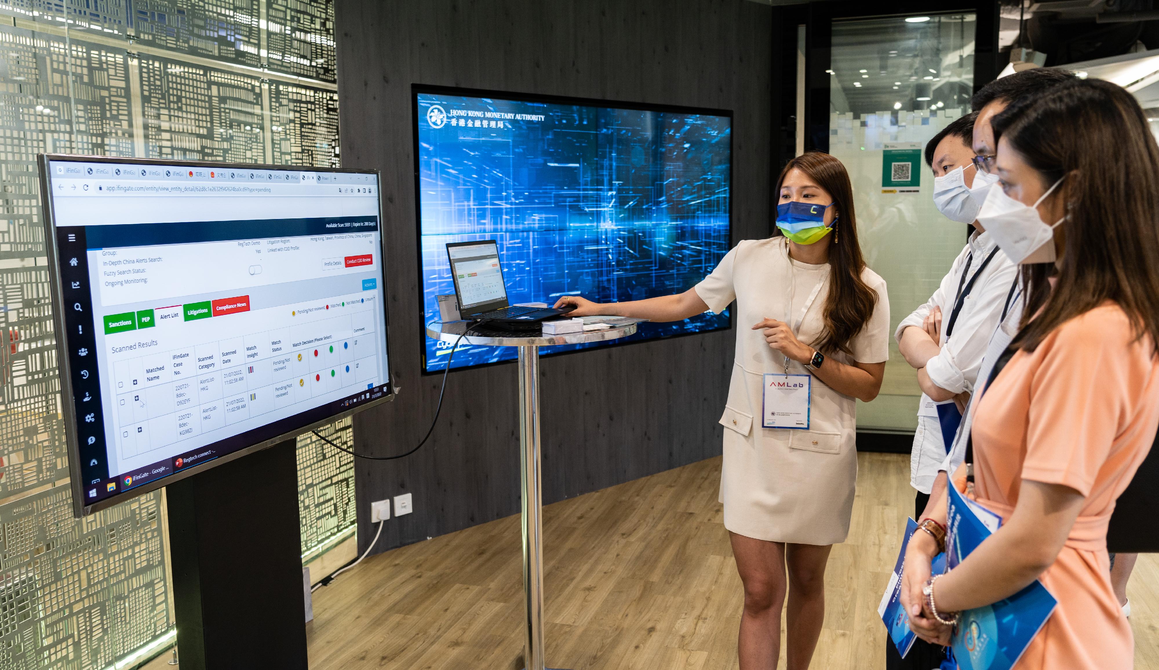 The Hong Kong Monetary Authority and Cyberport, supported by Deloitte, co-organised today (July 21) the second Anti-Money Laundering Regtech Lab. Photo shows technology companies in Cyberport demonstrating a range of tools and services and connect with participating banks.