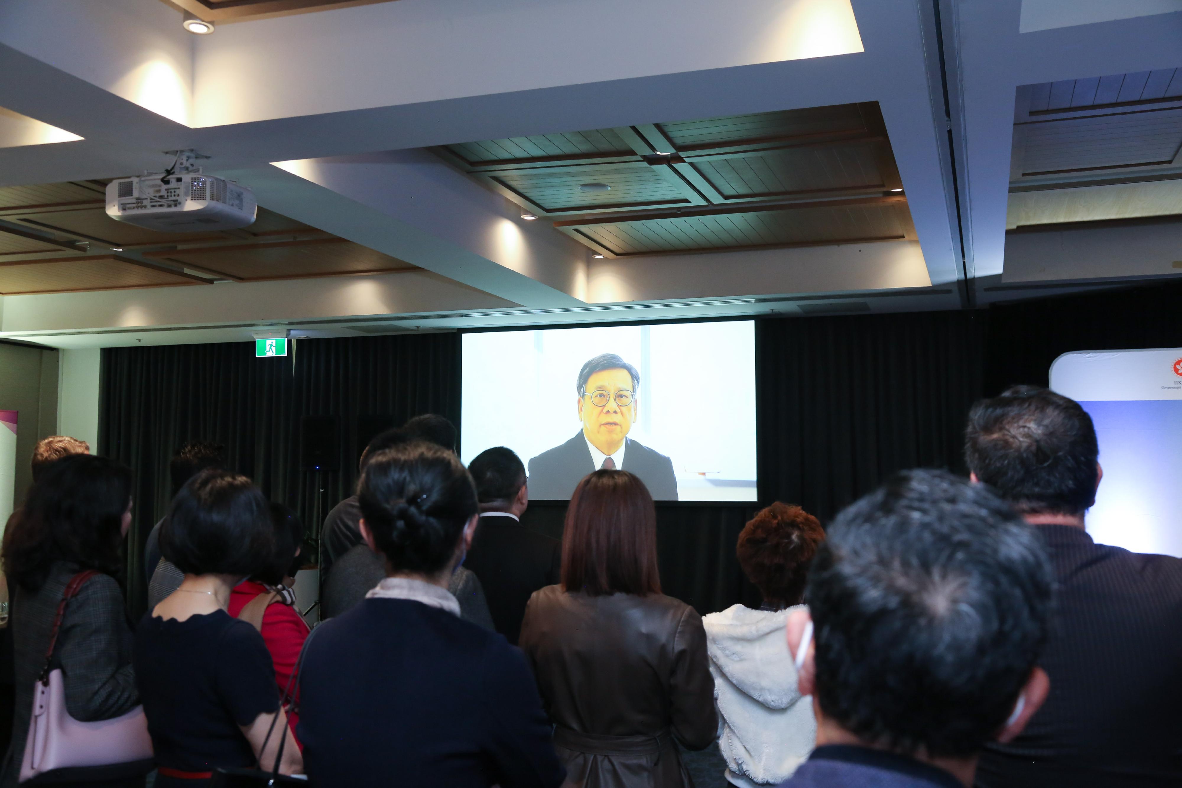 The Hong Kong Economic and Trade Office, Sydney hosted a reception in Auckland, New Zealand, today (August 2) to mark the 25th anniversary of the establishment of the Hong Kong Special Administrative Region. Photo shows the Secretary for Commerce and Economic Development, Mr Algernon Yau, delivering a virtual speech to highlight Hong Kong’s unique advantages under "one country, two systems" and its latest trade relationship with New Zealand.