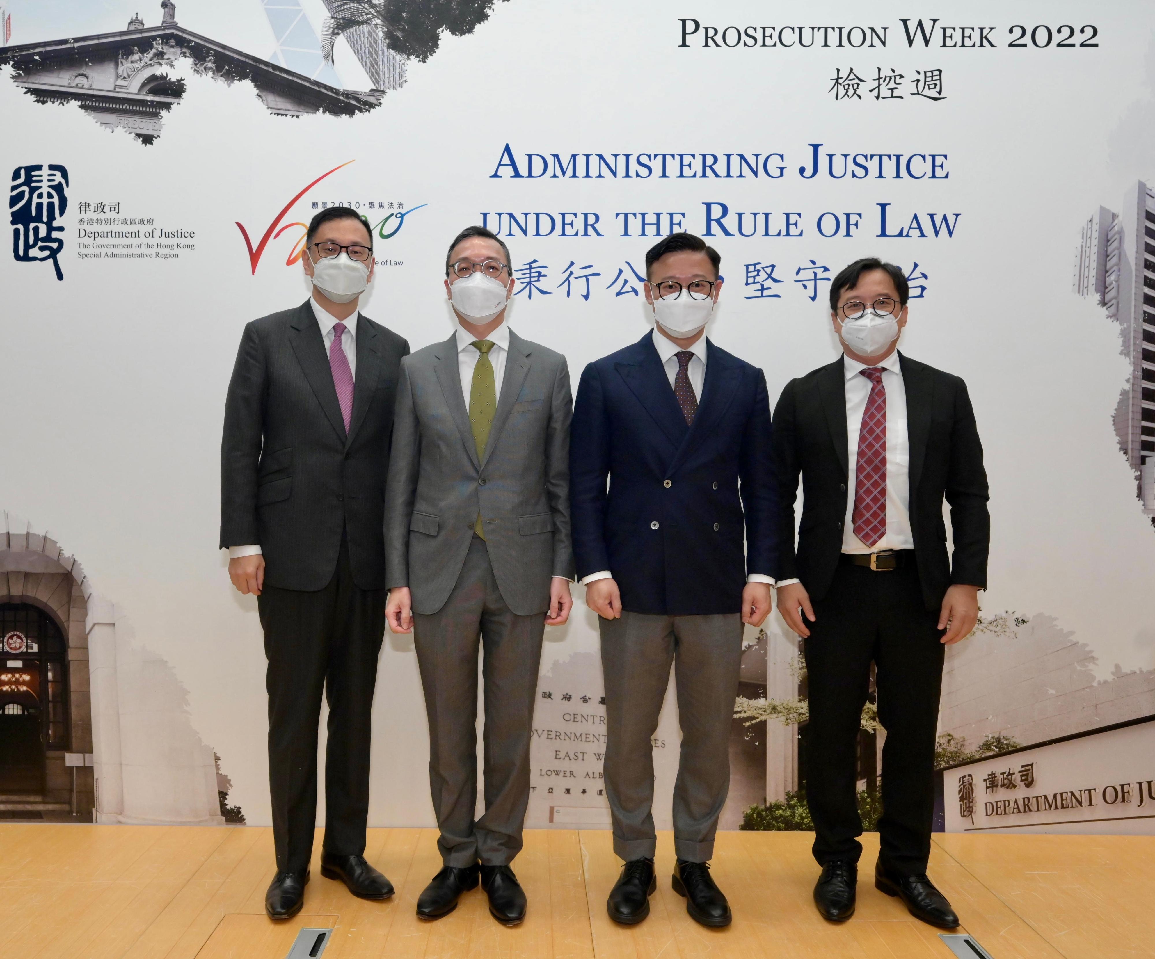 The Secretary for Justice, Mr Paul Lam, SC (second left), and the Deputy Secretary for Justice, Mr Cheung Kwok-kwan (second right), are pictured with the Chairman of the Hong Kong Bar Association, Mr Victor Dawes, SC (first left), and the President of the Law Society of Hong Kong, Mr Chan Chak-ming (first right), at the opening ceremony of Prosecution Week 2022 today (August 3).

