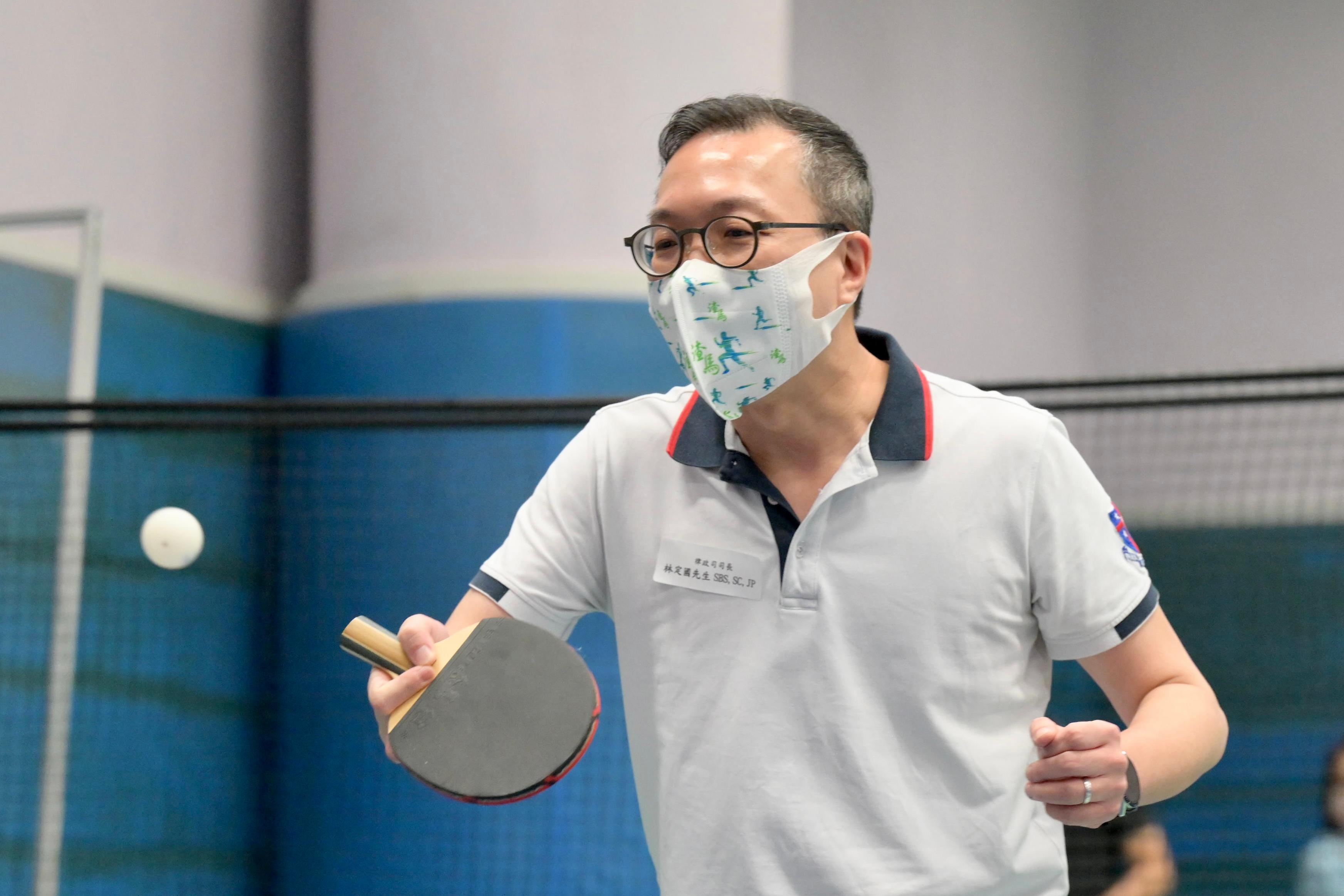 The Secretary for Justice, Mr Paul Lam, SC, joined the public for sports and recreation programmes at Island East Sports Centre this afternoon (August 7) as part of Sport For All Day 2022 organised by the Leisure and Cultural Services Department. Photo shows Mr Lam participating in a table tennis session.